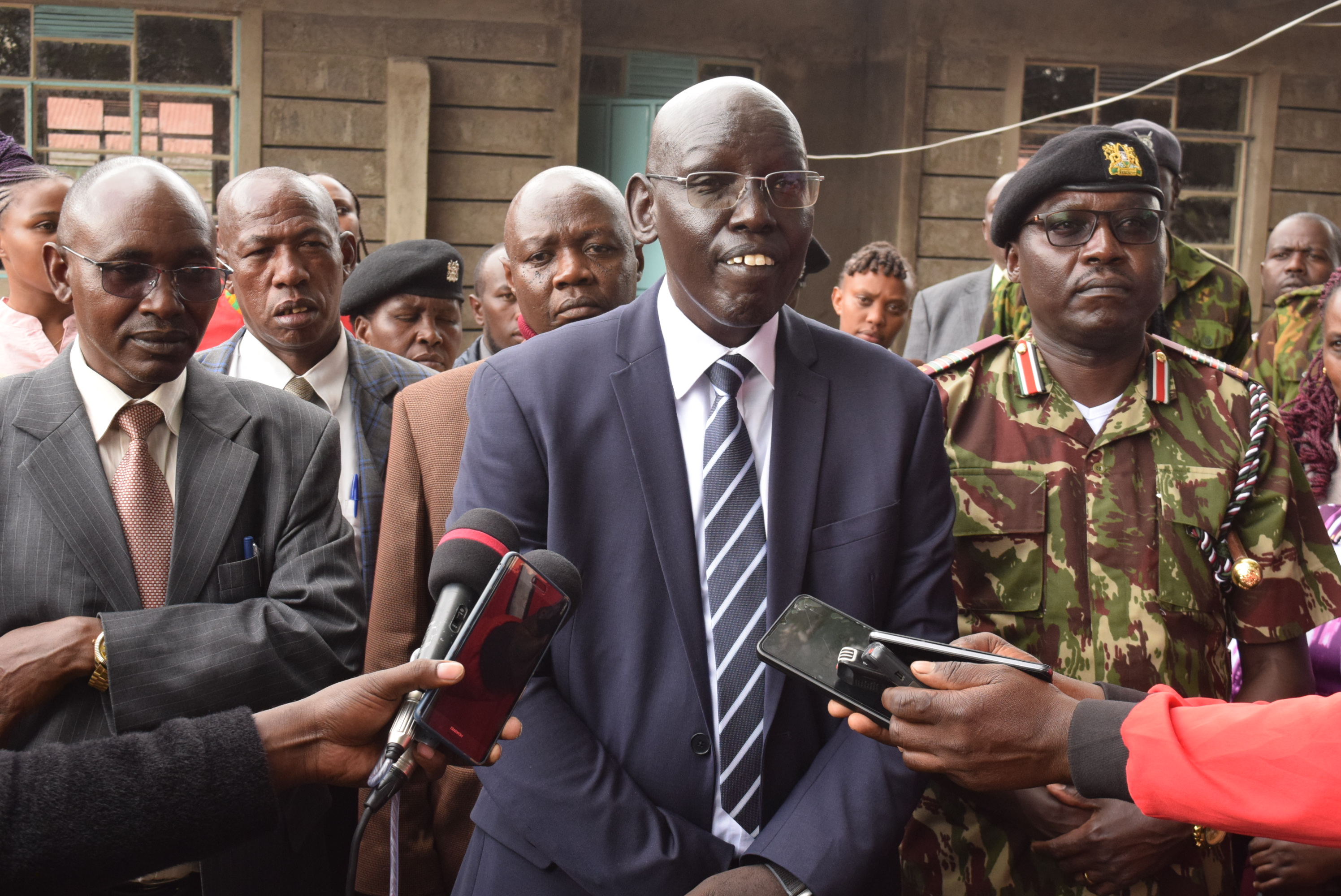 Dr. Belio kipsang, PS Basic Education addressing the media during inspection of construction of grade 9 classrooms in Nyandarua County (photo by Kimani Tirus)