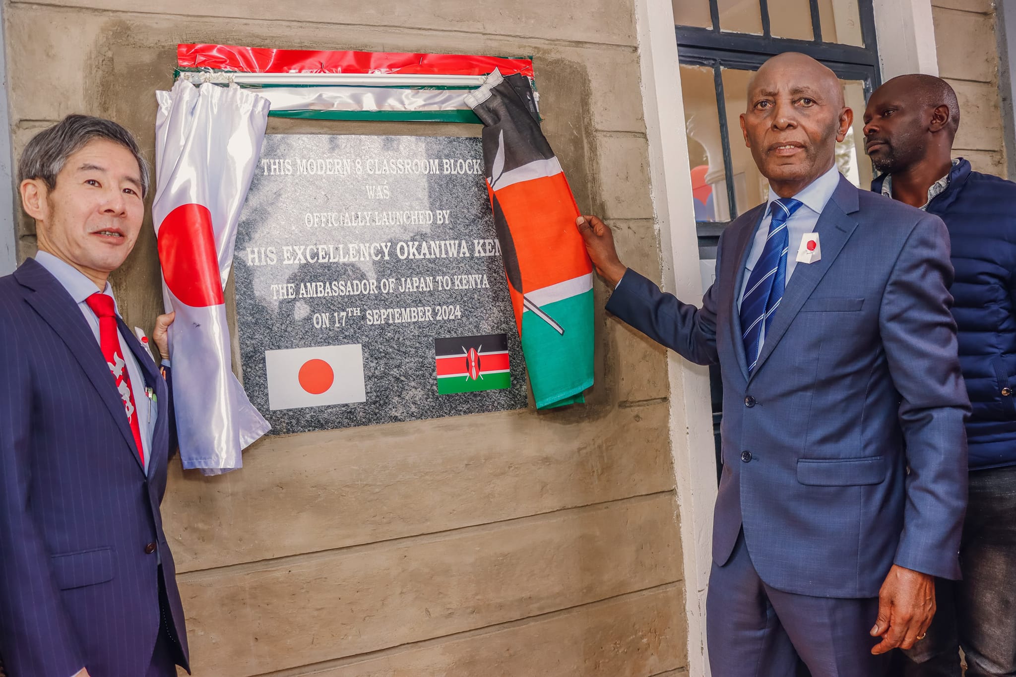 The Ambassador of Japan to Kenya Okaniwa Ken and Limuru member of parliament John Kiragu during the handover ceremony of an 8-classroom project funded by the Government of Japan through the Grant Assistance for Grassroots Human Security Projects (GGP).