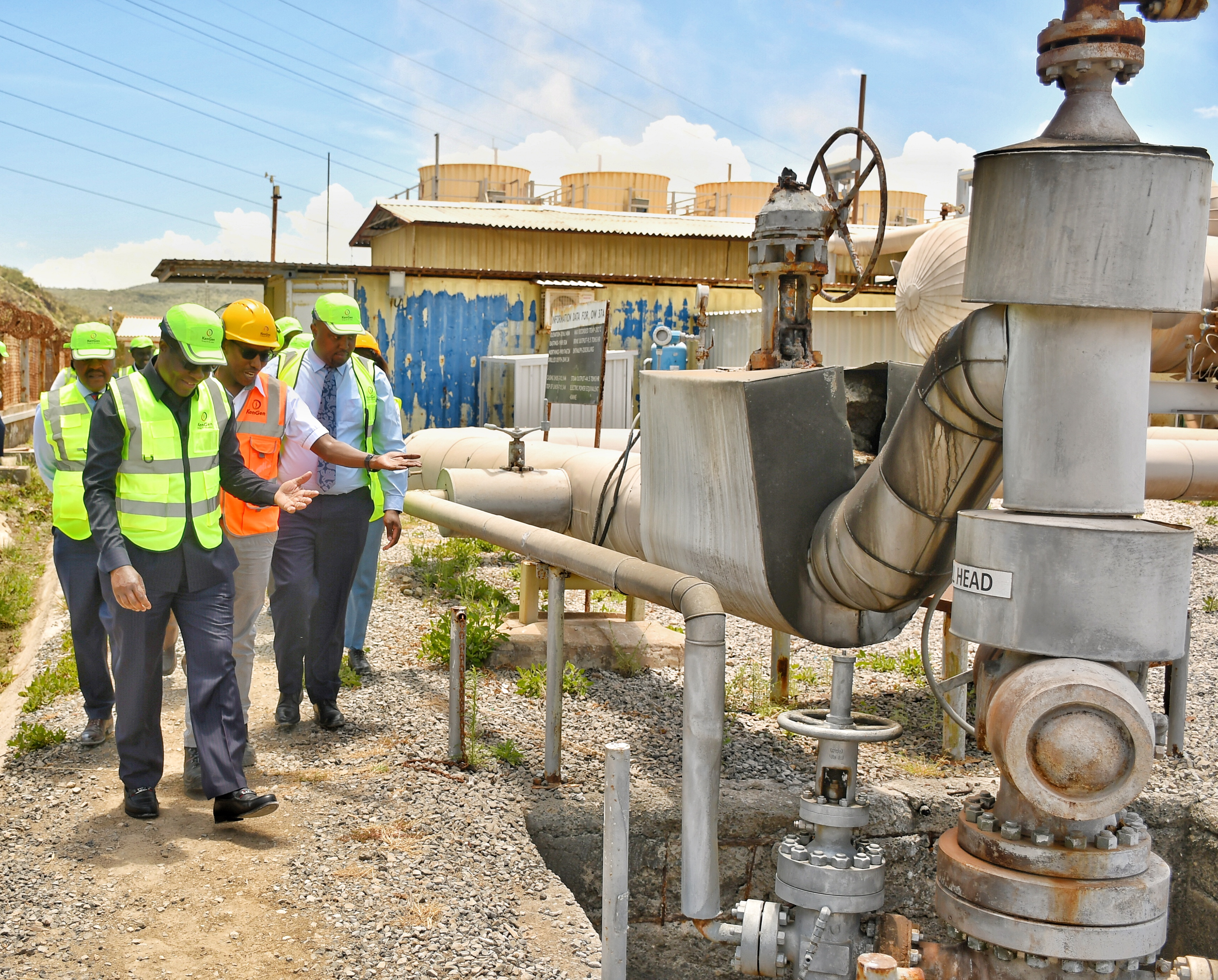 Energy and Petroleum Cabinet Secretary Hon. Opiyo Wandayi (left) , joined by the ministry office, inspects a geothermal wellhead during his official familiarization tour of geothermal- rich Olkaria area in Naivasha weeks ago. Photo/Erastus Gichohi.