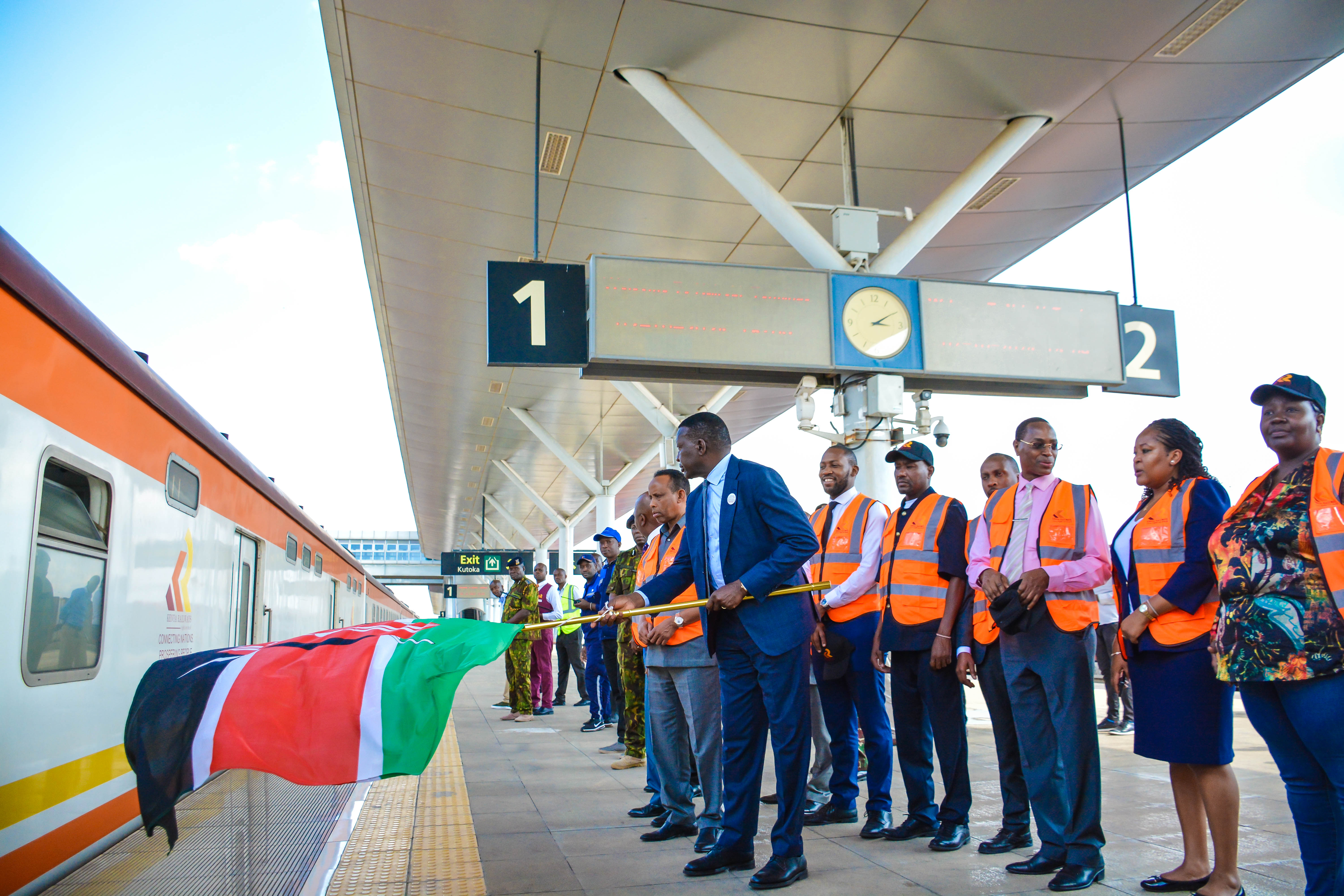  Ministry of Roads and Transport Cabinet Secretary (CS) Davis Chirchir flagging off the Madaraka Express Premium Class Service during the commissioning of the Nairobi Commuter Rail Service Stations and the KR Premium Class Operations.