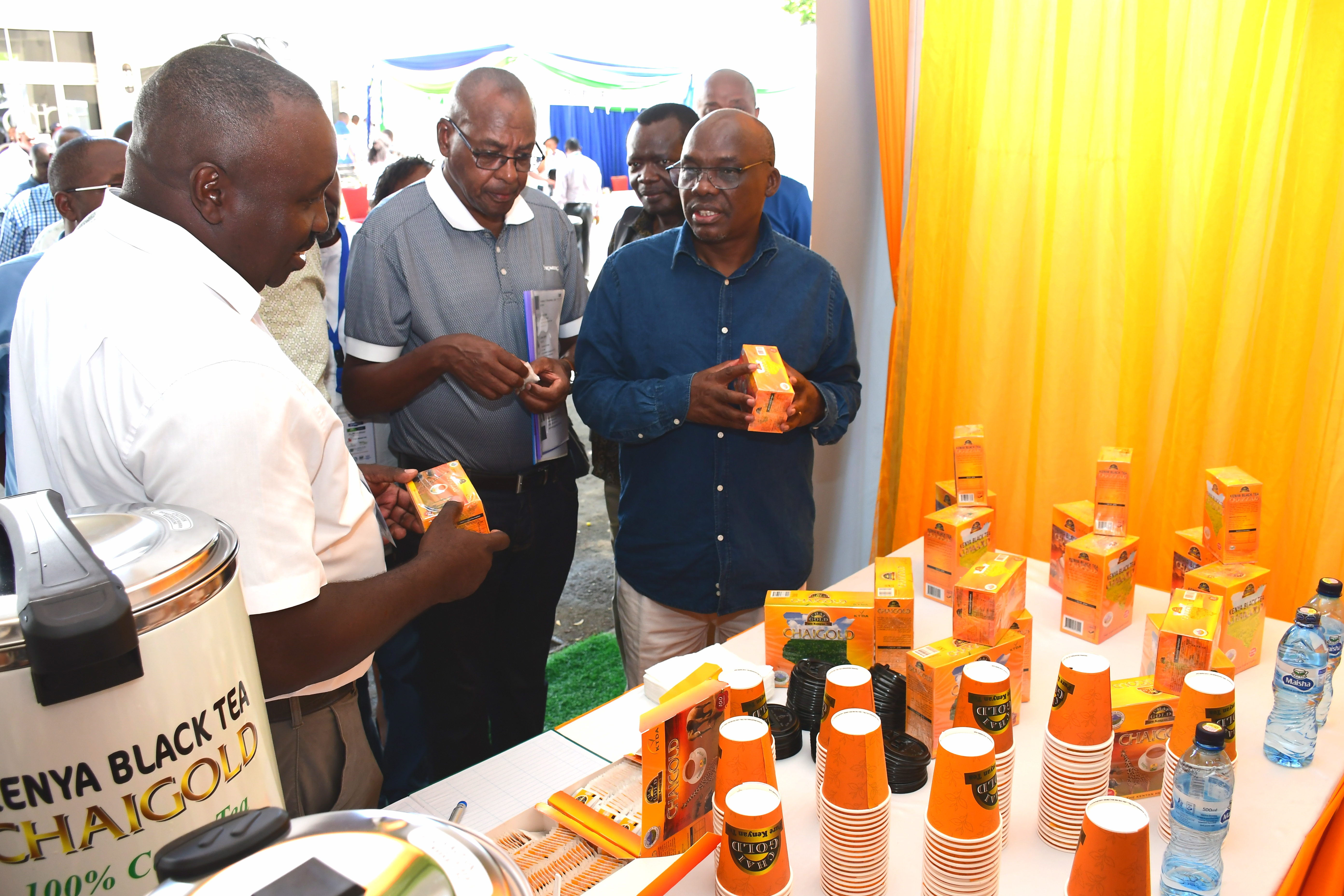 Agriculture PS Dr. Paul Ronoh (R) when he visited exhibition stands during the Tea Board of Kenya (TBK) centenary celebrations, Mombasa. Photo/Andrew Hinga