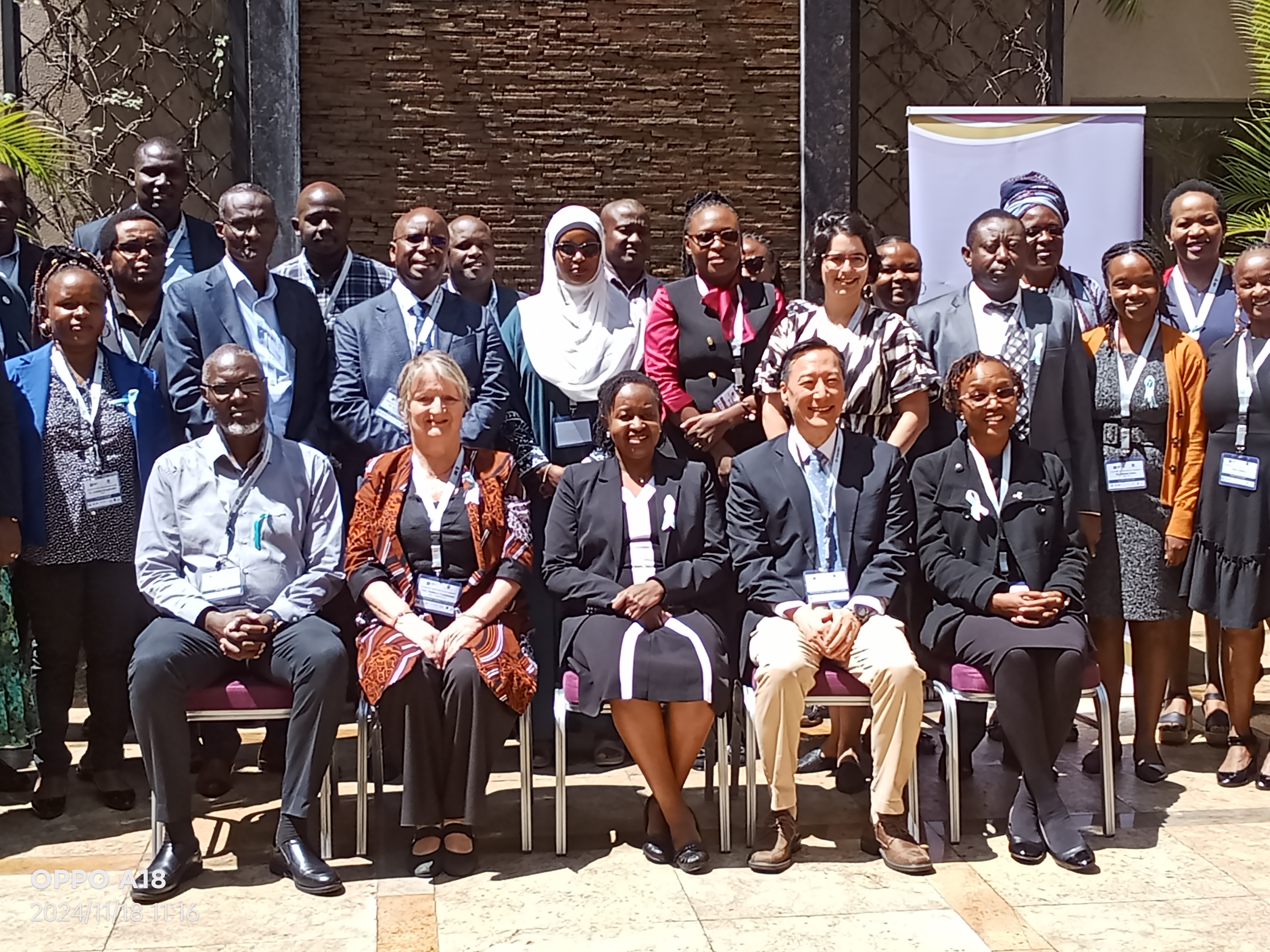 The Acting Head of the Division of Non-Communicable Diseases at the Ministry of Health Dr. Gladwell Gathecha (Seated Centre) poses for a photo with other health stakeholders during National Human Papillomavirus (HPV) and Cervical Cancer Symposium in Nairobi.