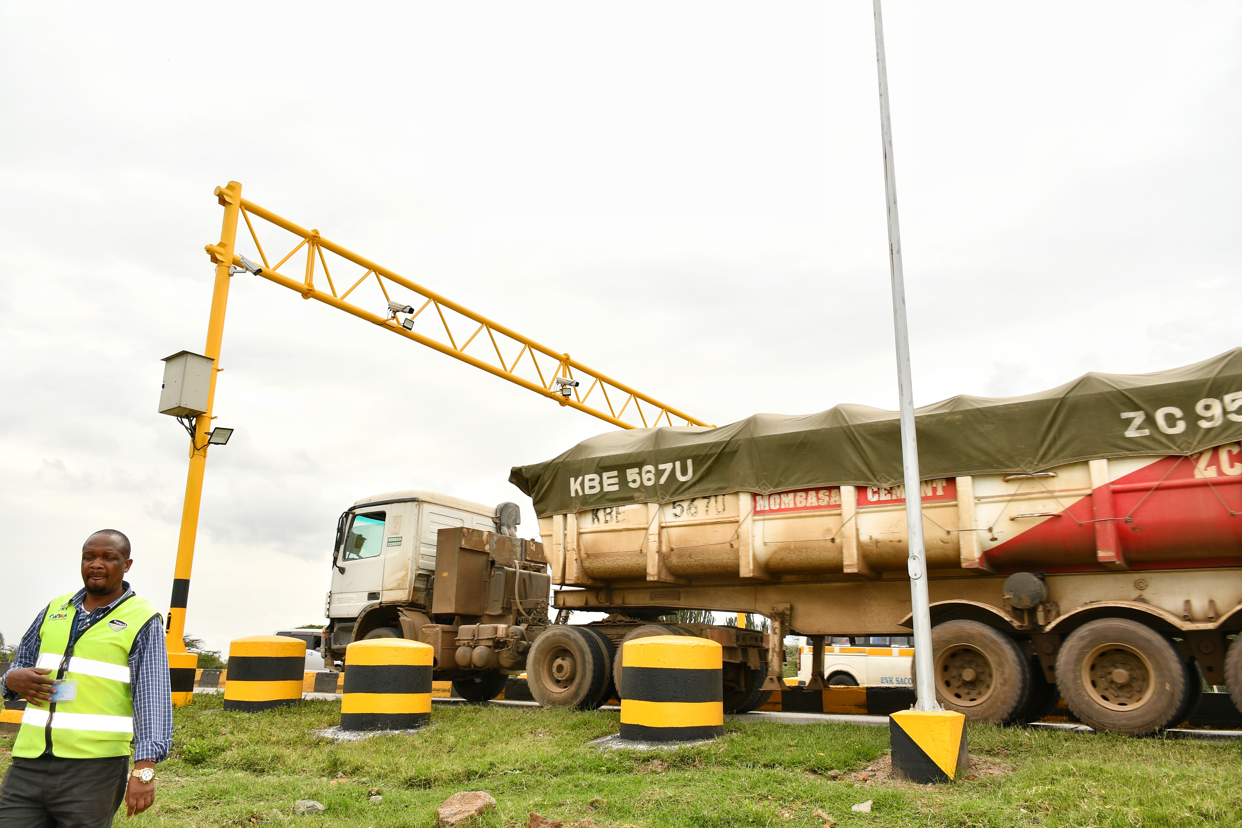 A long-distance cargo truck passes through one of the recently installed high-motion sensors to detect load weight and ensure compliance with strictly enforced load weight for both local and transit transporters at the Gilgil weighbridge. Photo/Erastus Gichohi.