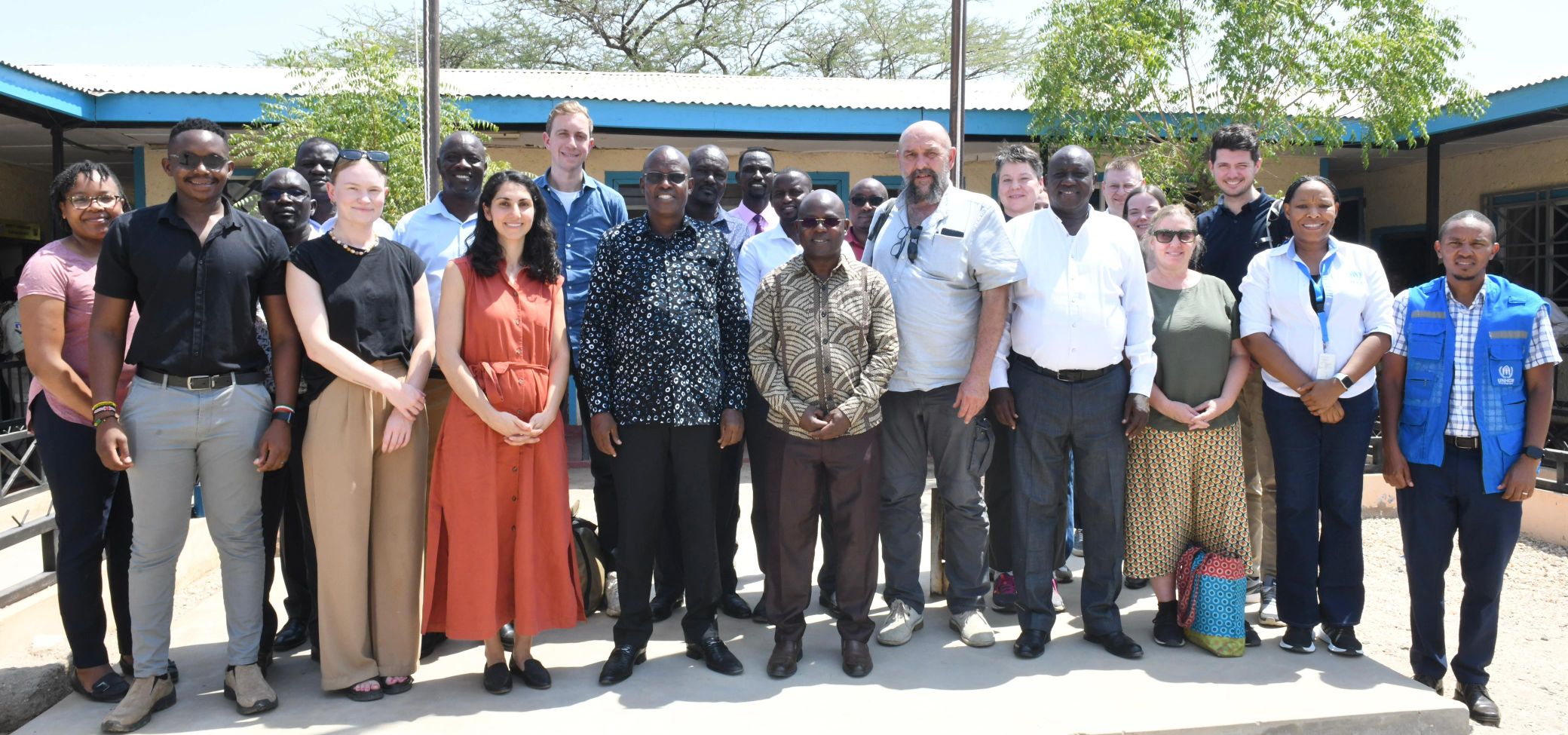 Governor Jeremiah Lomorukai (in black flowed shirt) pose for a group photo with a delegation from the Danish Embassy and UNHCR