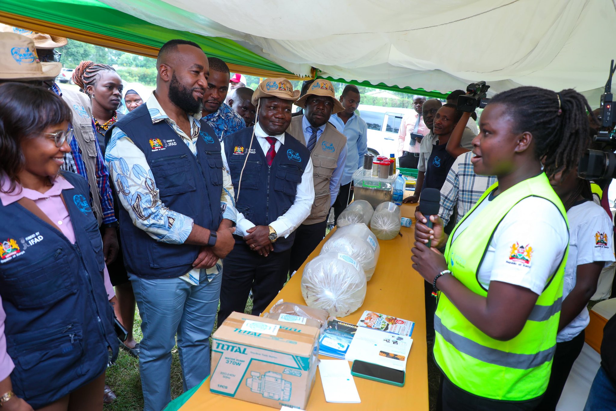 S for Mining, Blue Economy and Maritime Affairs Hassan  Joho with host Governor Fernandes Barasa and other  Government officials inspect fish feeds to be distributed  to farmers under the Aquaculture Business Development  Programme in Kakamega. Photo/ Moses Wekesa.