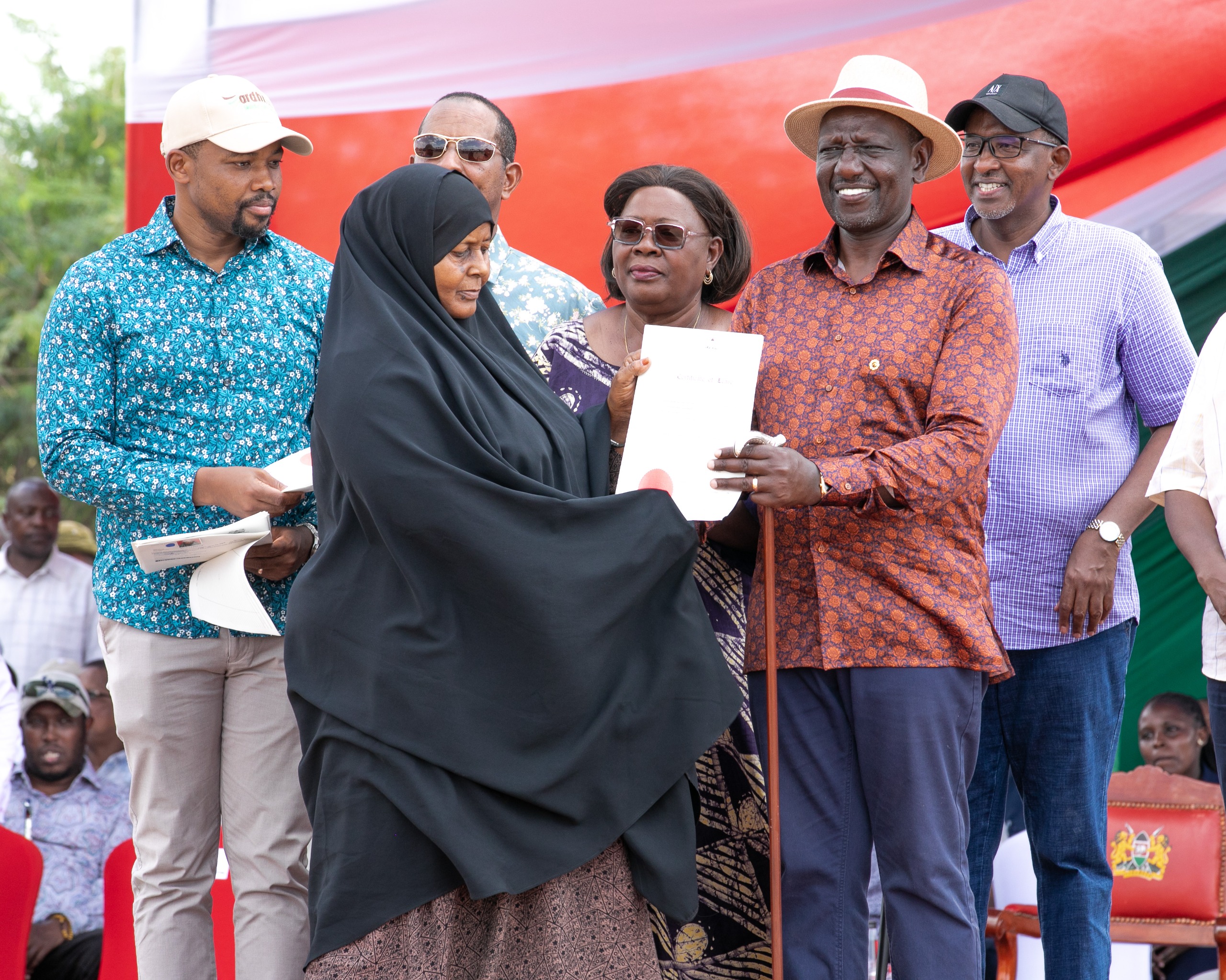 President William Ruto and senior government offocials during issuance of 3,000 title deeds to residents of five adju dication sections in Garissa Township Sub- County. Photo/Erick Kyalo