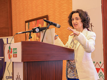 Appui au Développement Autonome (ADA), Executive Director, Laura Foschi, giving a  presentation at the African Inclusive Finance Week SAM 2025 media launch in Nairobi 