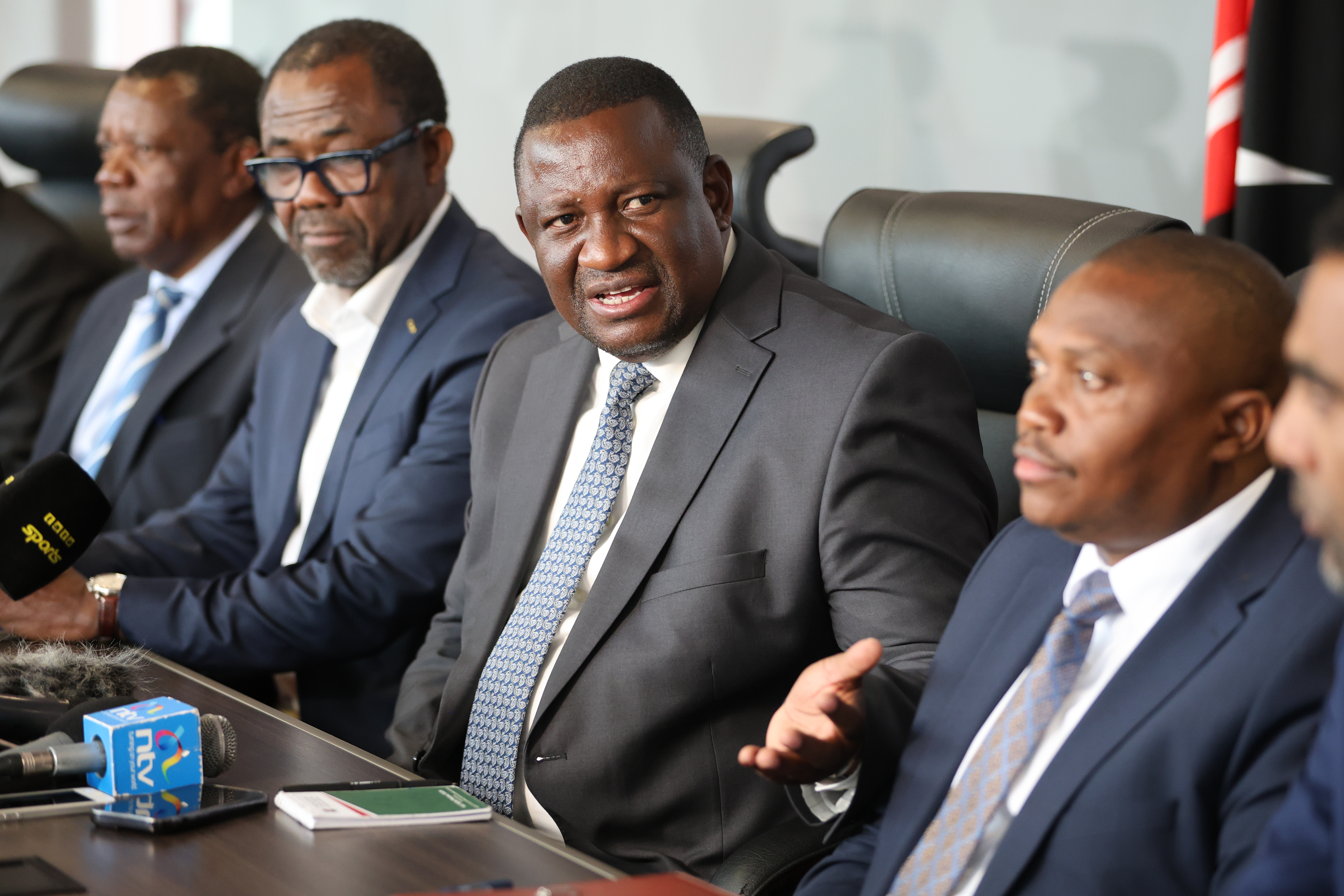 (From left) CAF Secretary General Veron Mosengo-Omba, Cabinet Secretary for Youth Affairs, Creative Economy and Sports, Salim Mvurya and Principal Secretary, State Department for Sports, Elijah Mwangi, during a CHAN 2024 Championship press briefing at the Talanta Plaza.