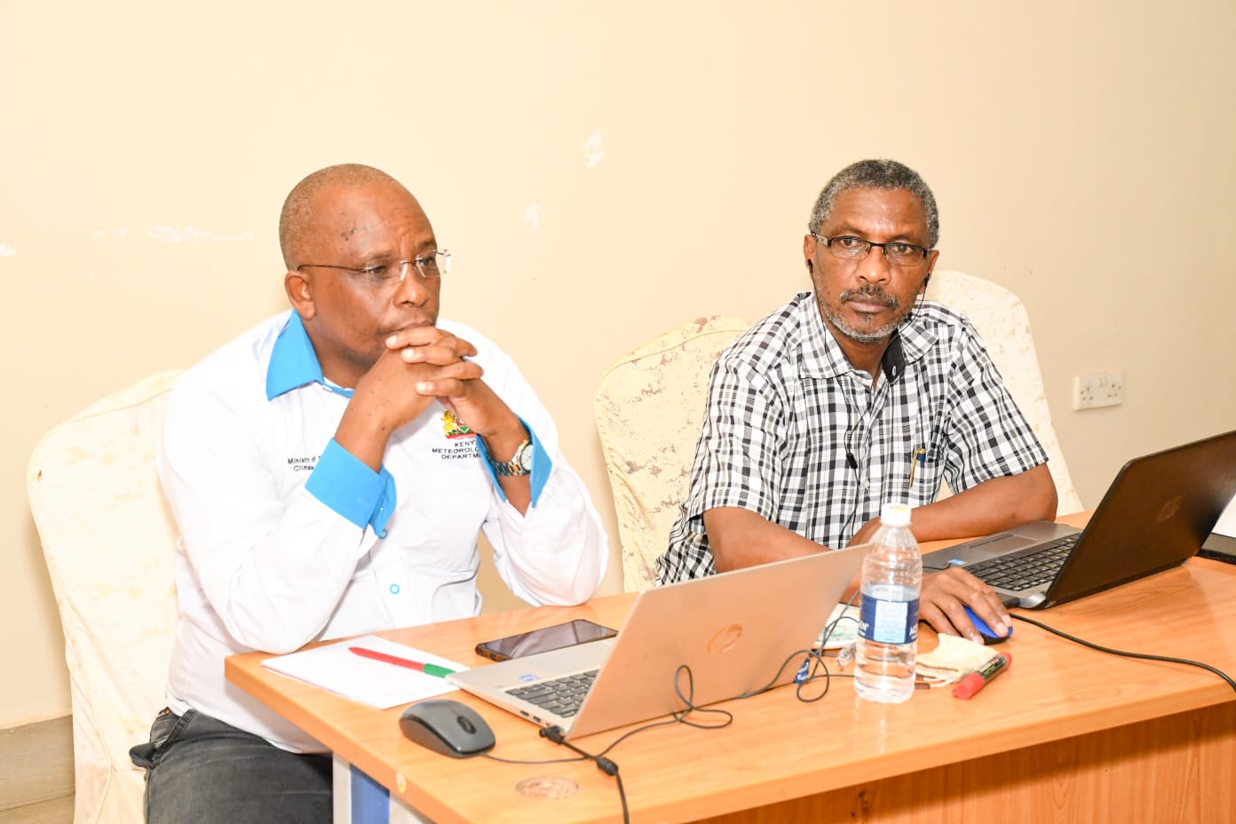 KMD deputy director Kennedy Thiong’o (left) follows the proceedings during the workshop. 