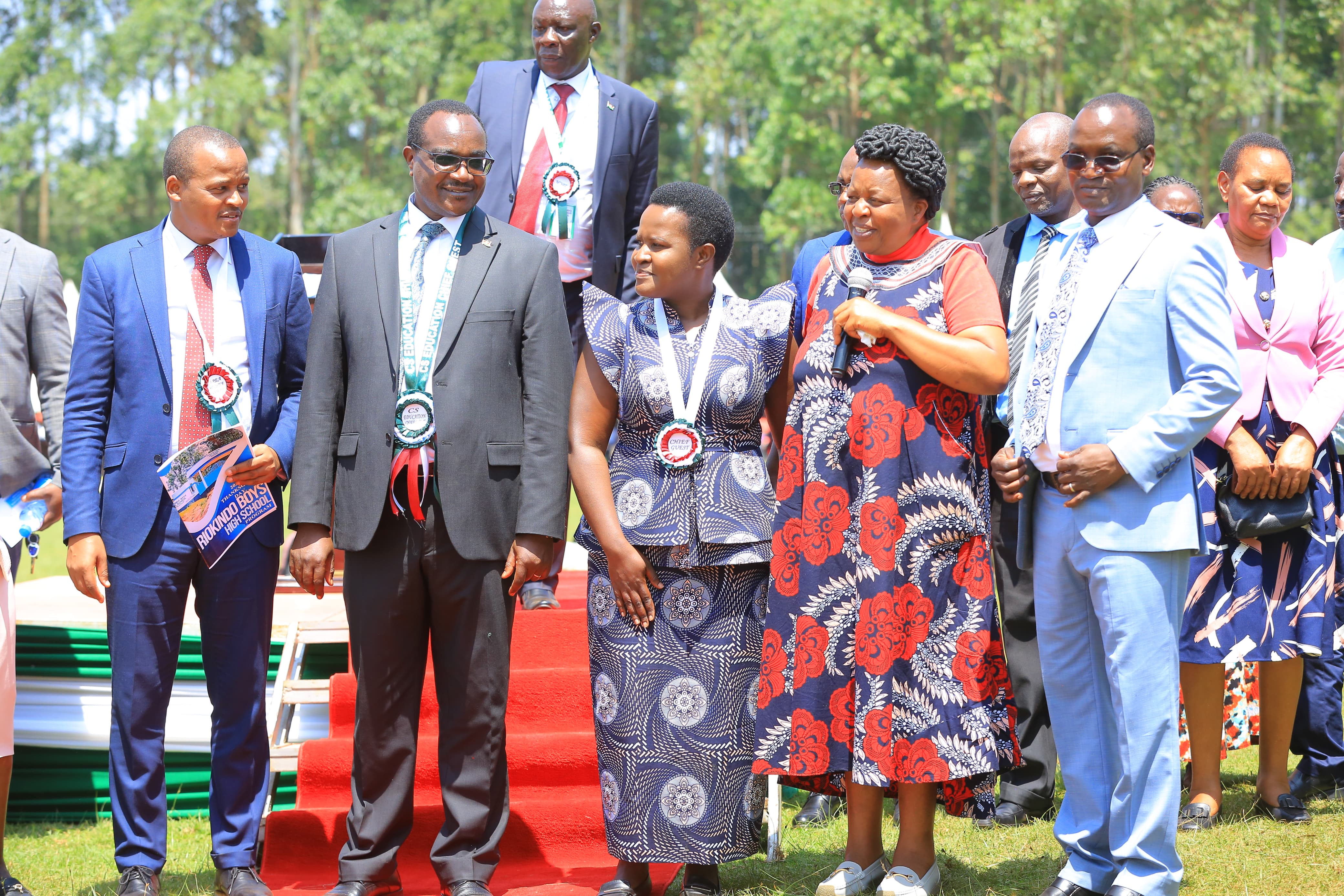 Education Ministry CS Ogamba Migosi (second Left) with scholars and educationist at Riokindo Boys High school in Bokimonge ward, Bomachoge Borabu Constituency in Kisii County