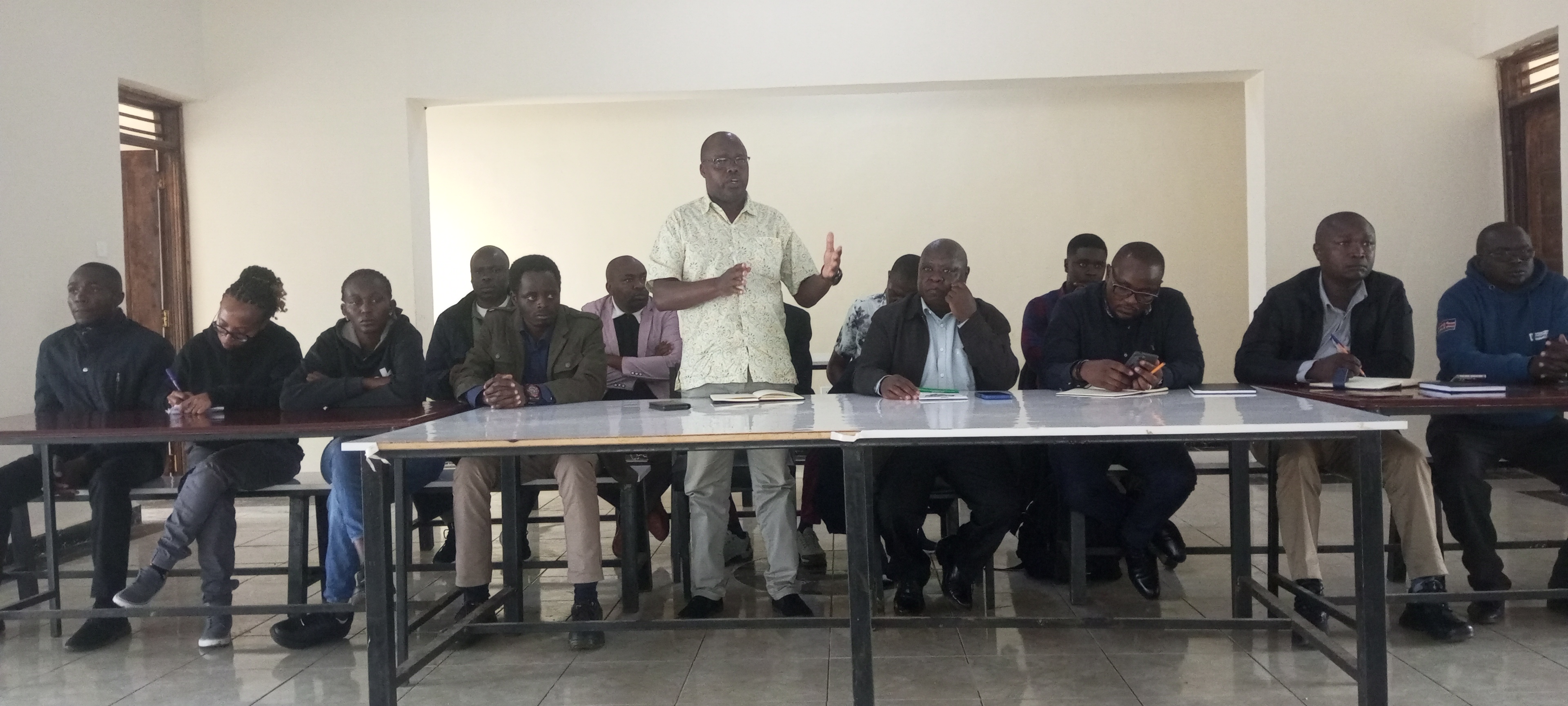 Enock Kipseba,Secretary for Geological Survey in the State Department for Mining under the Ministry of Mining,Blue Economy and Maritime Affairs, making his address at Sangak primary school in Pokot Central sub county,where he introduced the geological survey team to the public Photo By Anthony Melly