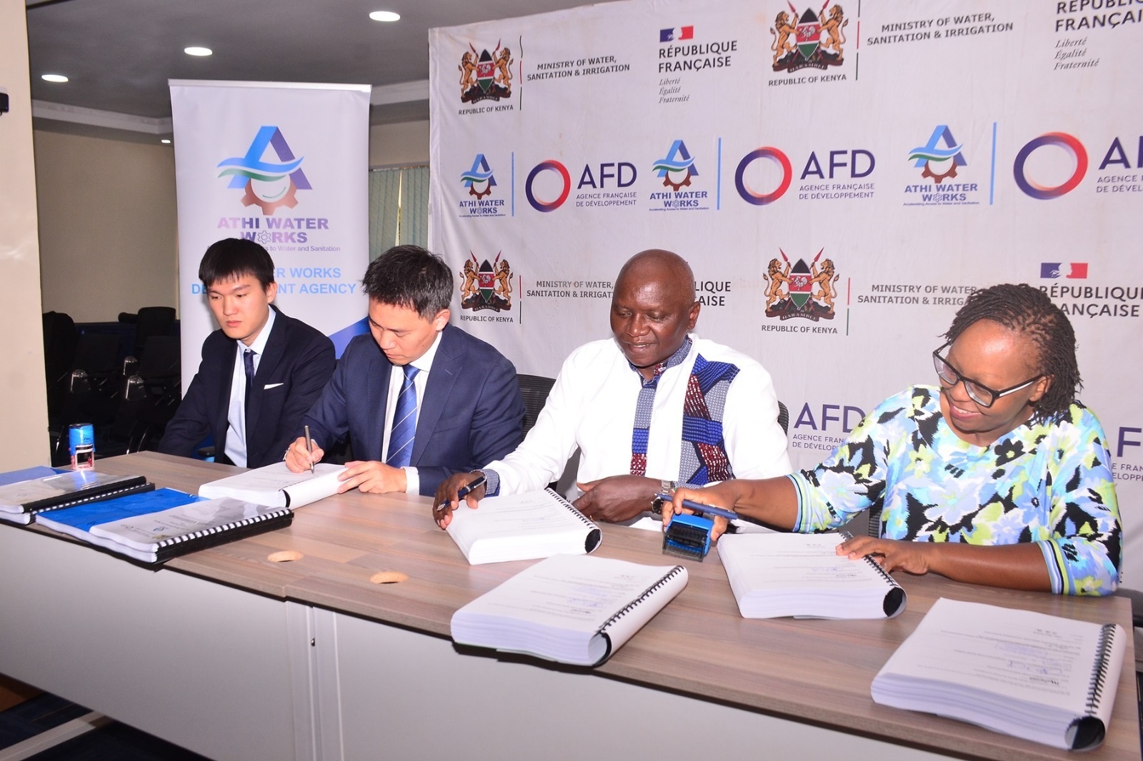 Athi Water Works Development Agency (AWWDA) CEO Eng. Joseph Kamau (second right), flanked by Corporation Secretary Joyce Mukururi (right), with Pan Nan, and Liao Huihuang during the signing of the landmark partnership.