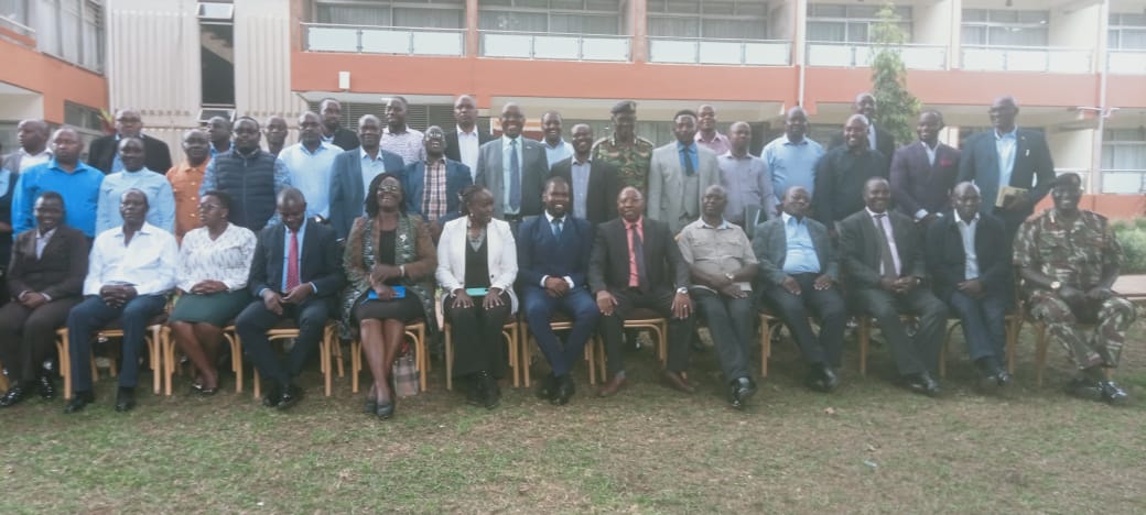 Officials from the Executive Office of the President pose for a group photo, with the Western Regional Commissioner, Macharia Irungu after holding a two-day regional retreat that focused on synchronization of National Government Administration officers, Ministries, Departments and Agencies (MDAs) implementing Bottom-Up Economic Transformation Agenda within the Western region.