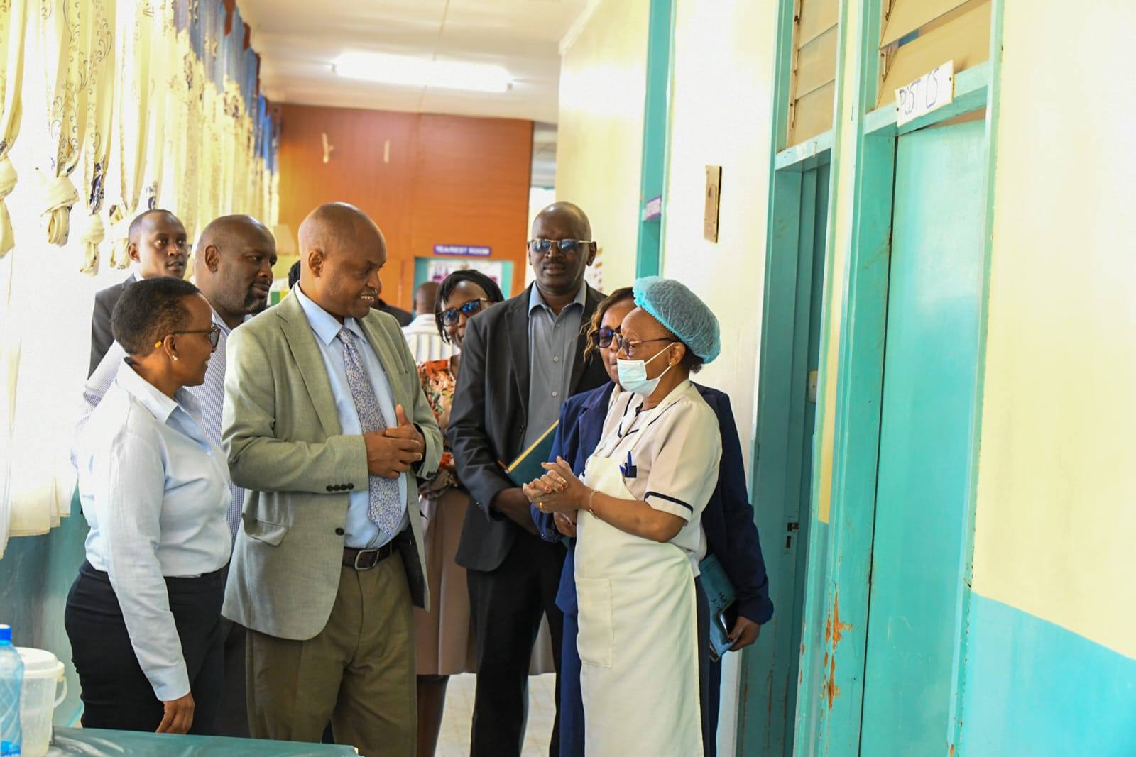 Health advisor in the office of the President Dr Wilson Aruasa (2nd L) speaking at Gilgil  Sub County Hospital. Photo by Esther Mwangi