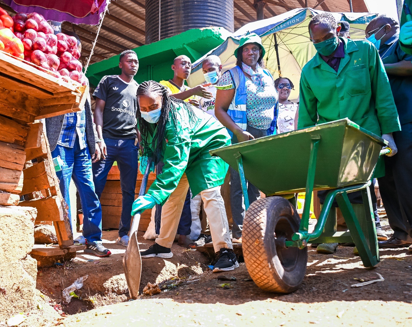 Principal Secretary for Public Health and Professional Standards Ms Mary Muthoni leads a clean-up exercise at Ruiru Market, Kiambu County, during the activation of the Epuka Uchafu, Afya Nyumbani campaign.