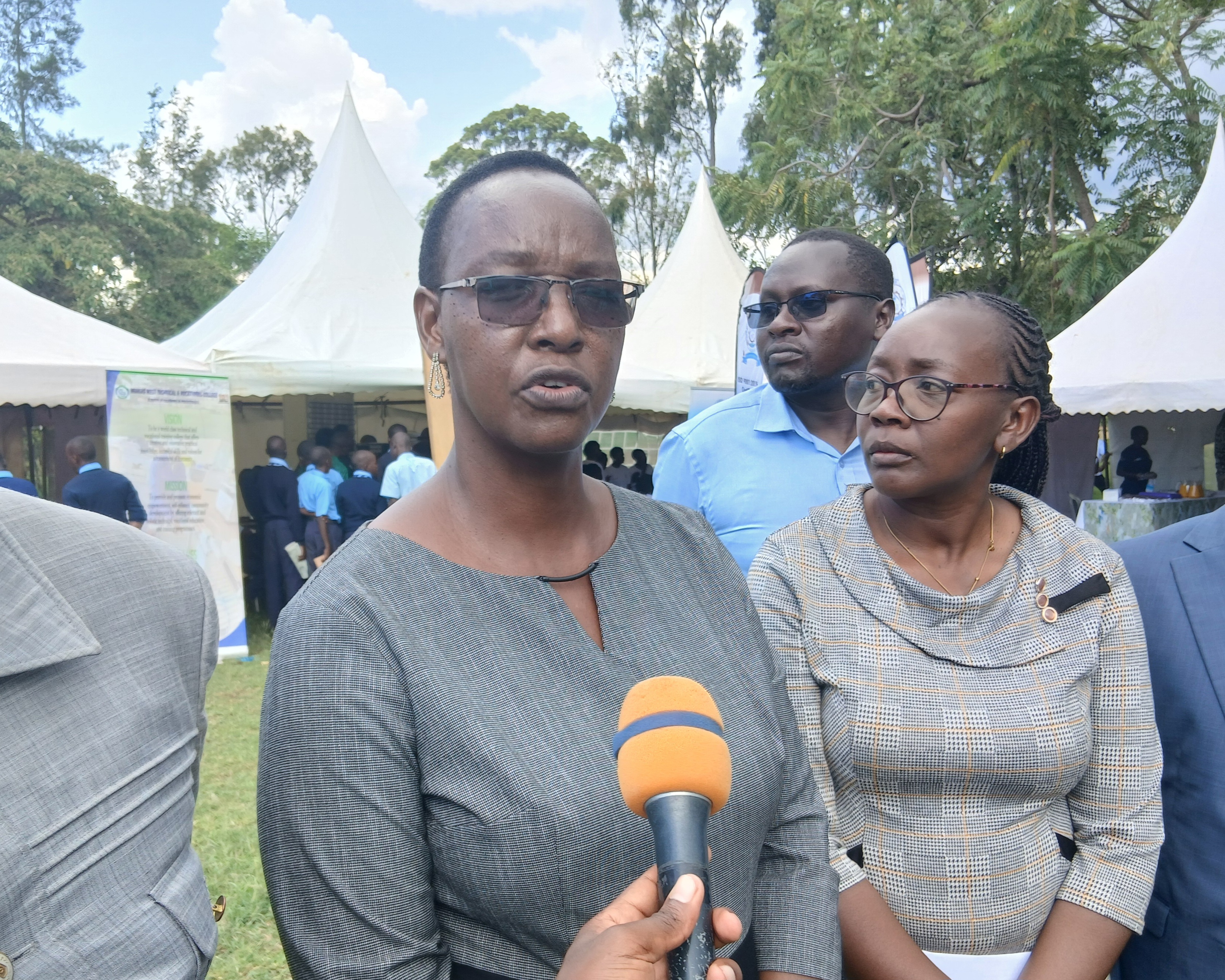 Regional TVET Director for Kisumu and Siaya, Audrey Monica addressing journalists during the Western Regional Dual TVET week at Ramogi Institute of Advanced Technology (RIAT) in Kisumu. PHOTO BY CHRIS MAHANDARA