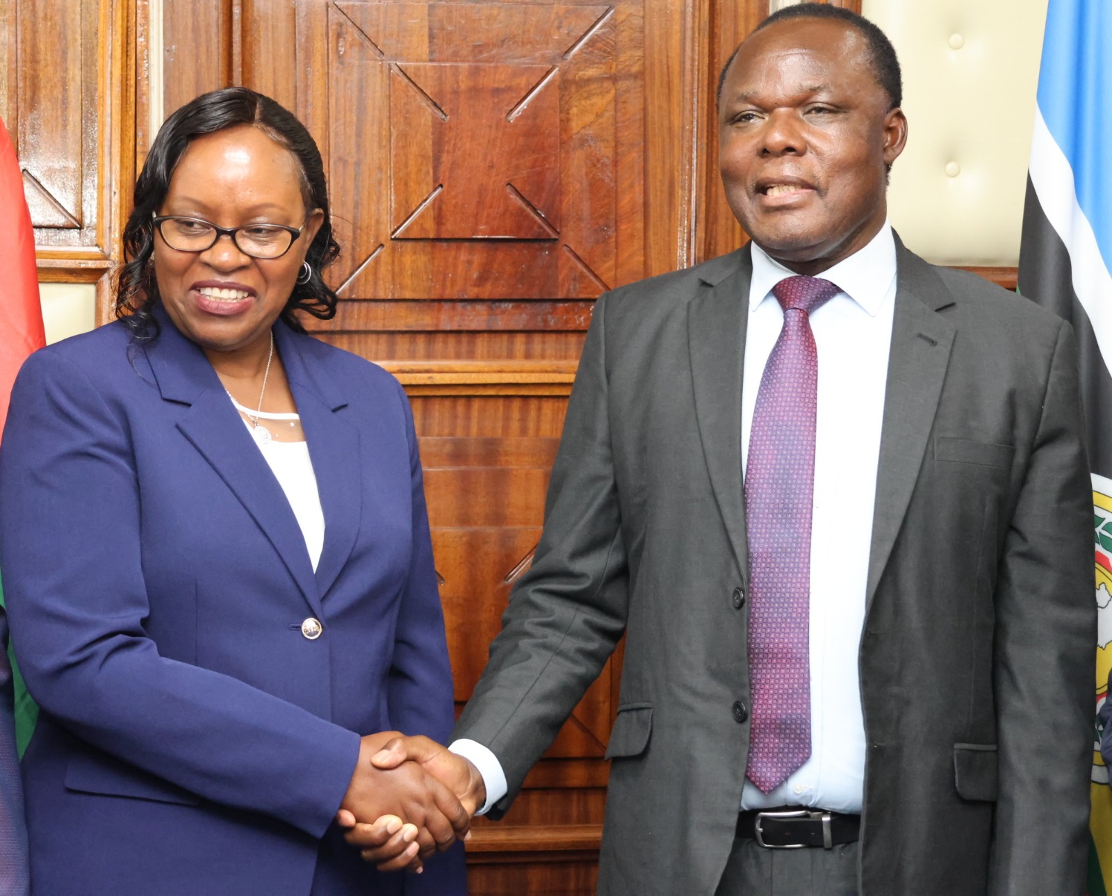 Industry Principal Secretary Dr. Juma Mukhwana (right) welcoming Dr. Monica Wanjiru Muiru, Vice Chairperson and Commissioner of the Ethics and Anti-Corruption Commission, to a meeting on compliance monitoring of the County Aggregation and Industrial Parks Programme at the State Department for Industry headquarters, NSSF Building in Nairobi.