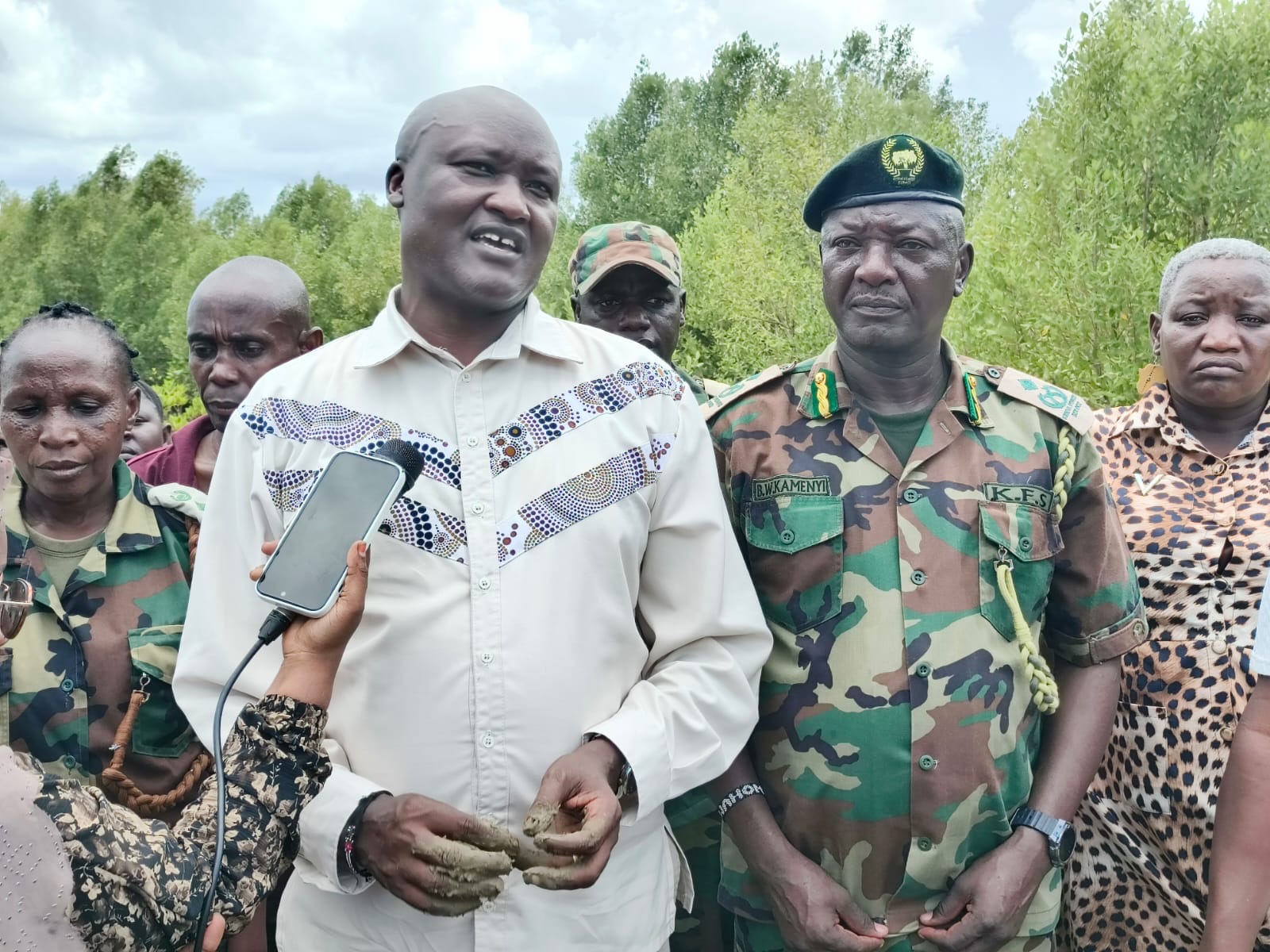 Conservation Secretary State Department for Wildlife Dr. John Chumo accompanied by Mombasa County Forest Conservator Bernard Wahome during a media briefing following a habitat restoration exercise at Miritini in Mombasa County. PHOTO: CHARI SUCHE