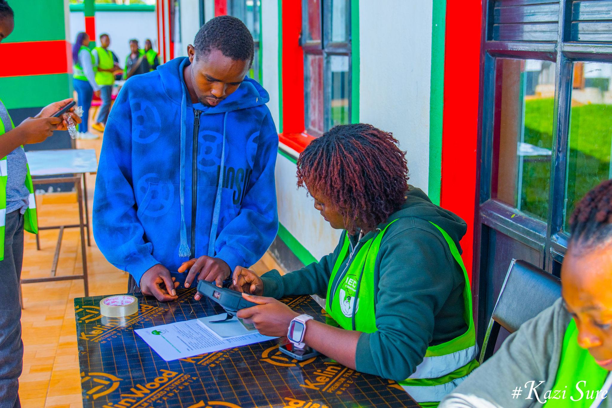 An IEBC clerk registers a new voter at Ndumberi ICT Hub in Kiambu County during the ongoing enhanced voter registration exercise.