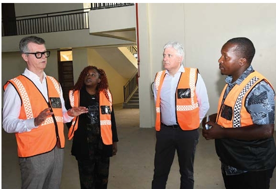 ASSOMAC President Mauro Bergozza, left, Krystal Midega of the Italian Trade Agency second left,  ASSOMAC Director General Agostino Apolito second right, and KLIP Site Engineer Gibert far right, during  a tour of the Kenanie Leather Industrial Park. 