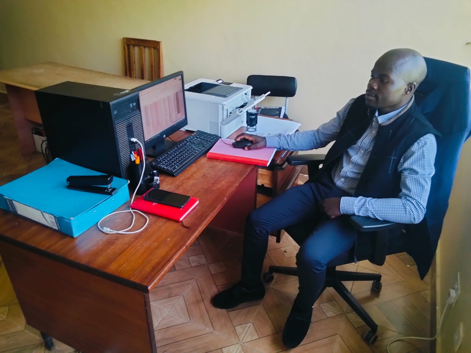 Sabatia Sub County Civil Registrar, Edwin Nganga, in his office. PHOTO: MAUREEN IMBAY