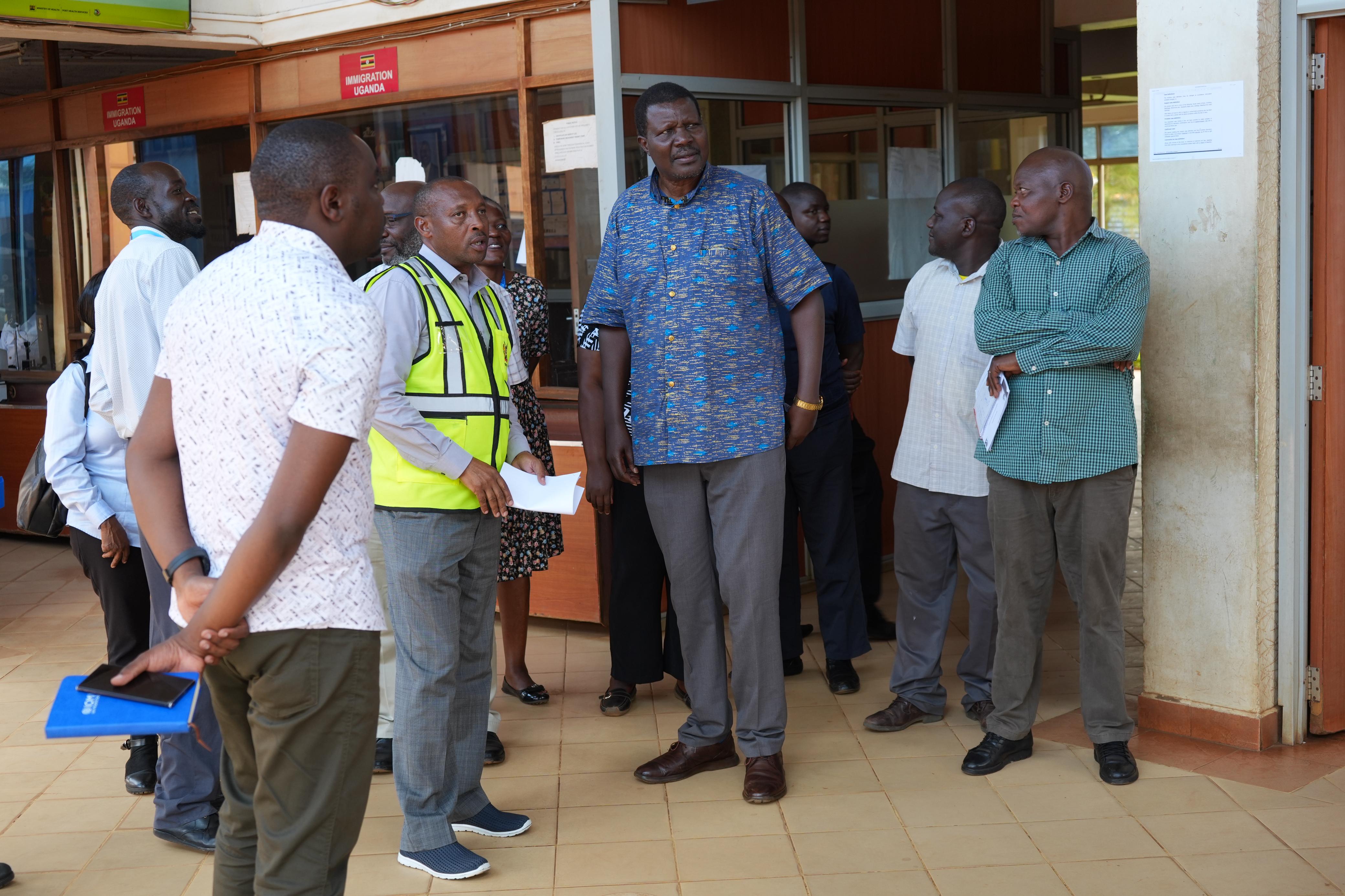Prof. Elijah Sangok (in checked shirt) during the inspection at the Busia border port health. 
