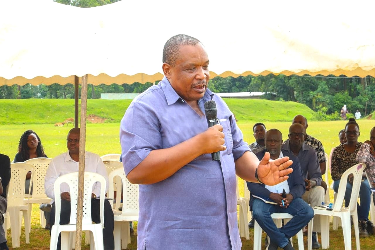 The Kakamega County Artisanal Mining Committee chairman Patrick Ligami speaking during a sitting by the County Assembly of Kakamega during the public hearing of petitions against the proposed 680 million shillings of underground mining of gold by Shanta Gold Kenya at Malinya stadium