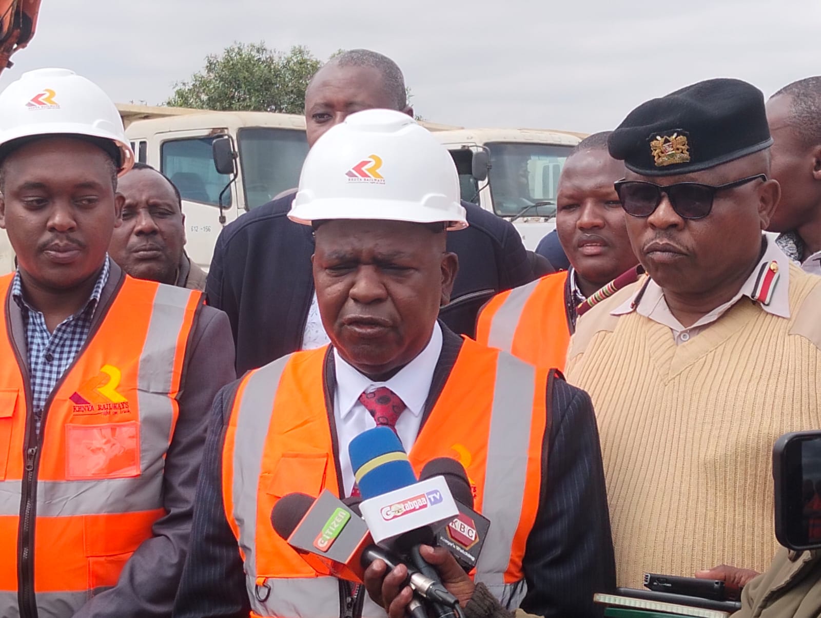 Kenya Railways Managing Director Philip Mainga (centre) addresses the media during the official launch of the Naivasha–Kisumu–Malaba Standard Gauge Railway (SGR) extension in Narok. The project is expected to enhance transport links between the Port of Mombasa and the Uganda border. PHOTO: HILLARY SHIMNAGHA/KNA.