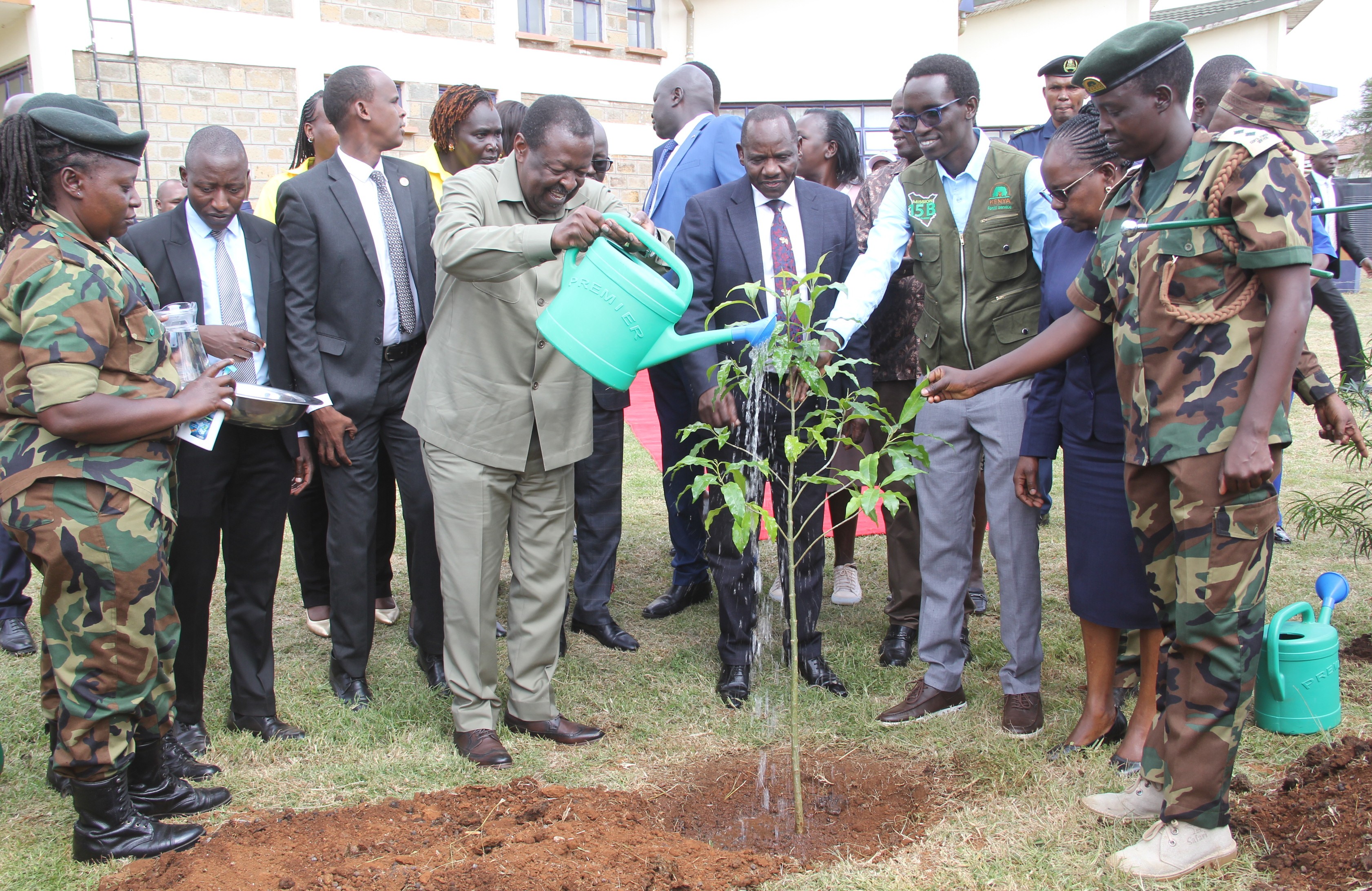 Prime Cabinet Secretary and Cabinet Secretary for Foreign and Diaspora Affairs Musalia Mudavadi plants a tree seedling during the official launch of the Integrated Natural Resources Management Programme (INReMP) at the University of Eldoret in Uasin Gishu County