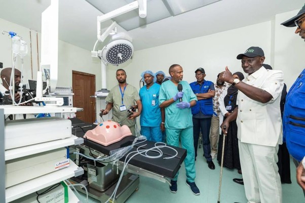 President Willam Ruto (R) inspecting a modern operating theatre under the National Equipment Service Programme.