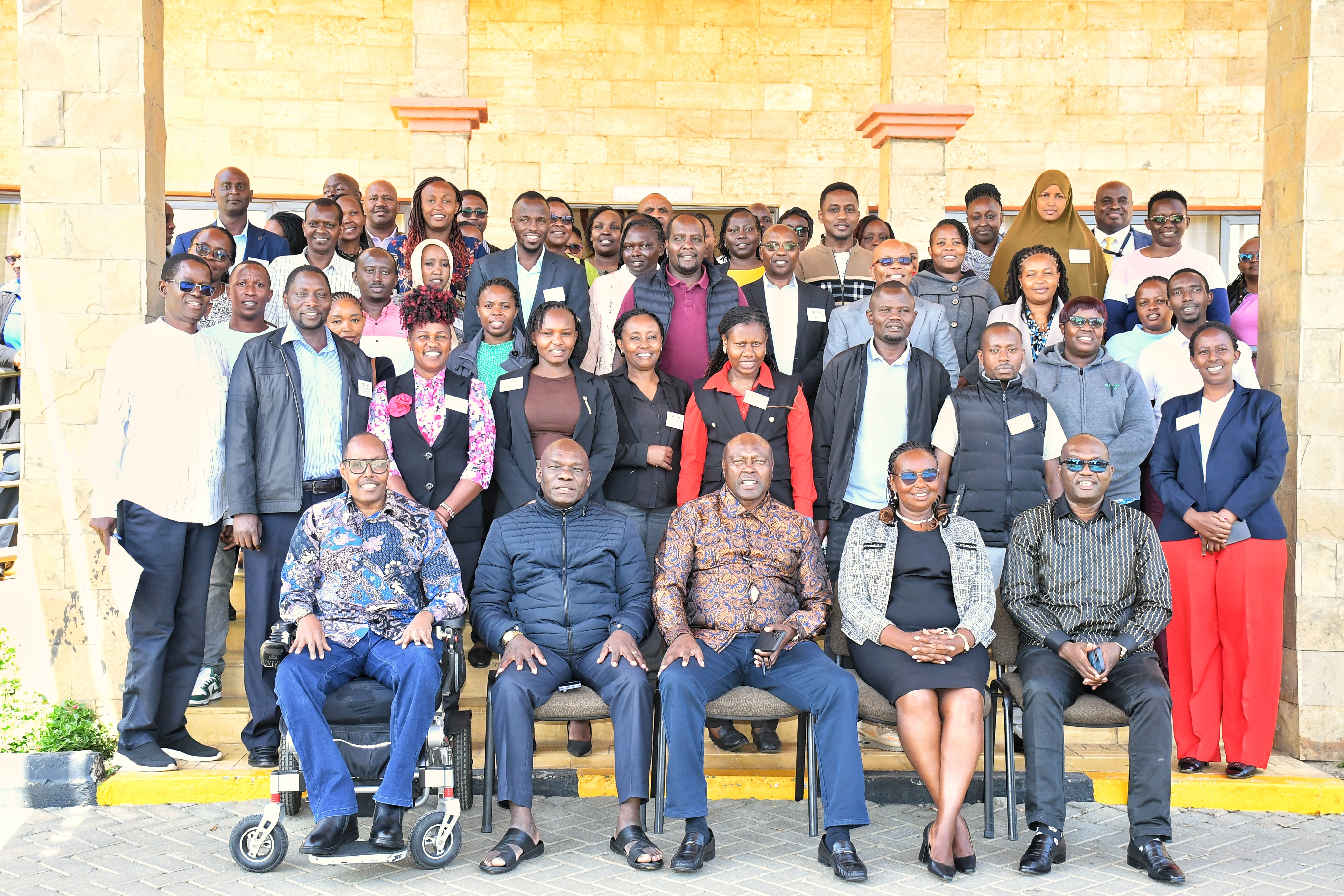 Public Service Commission Chairman Francis Meja (centre, front row) joined by fellow Commissioners during the training programme held in Naivasha for mentors in Ministries, Departments and Agencies who will be tasked to oversee successful induction and guide interns posted by the Commission. PHOTO: ERASTUS GICHOHI