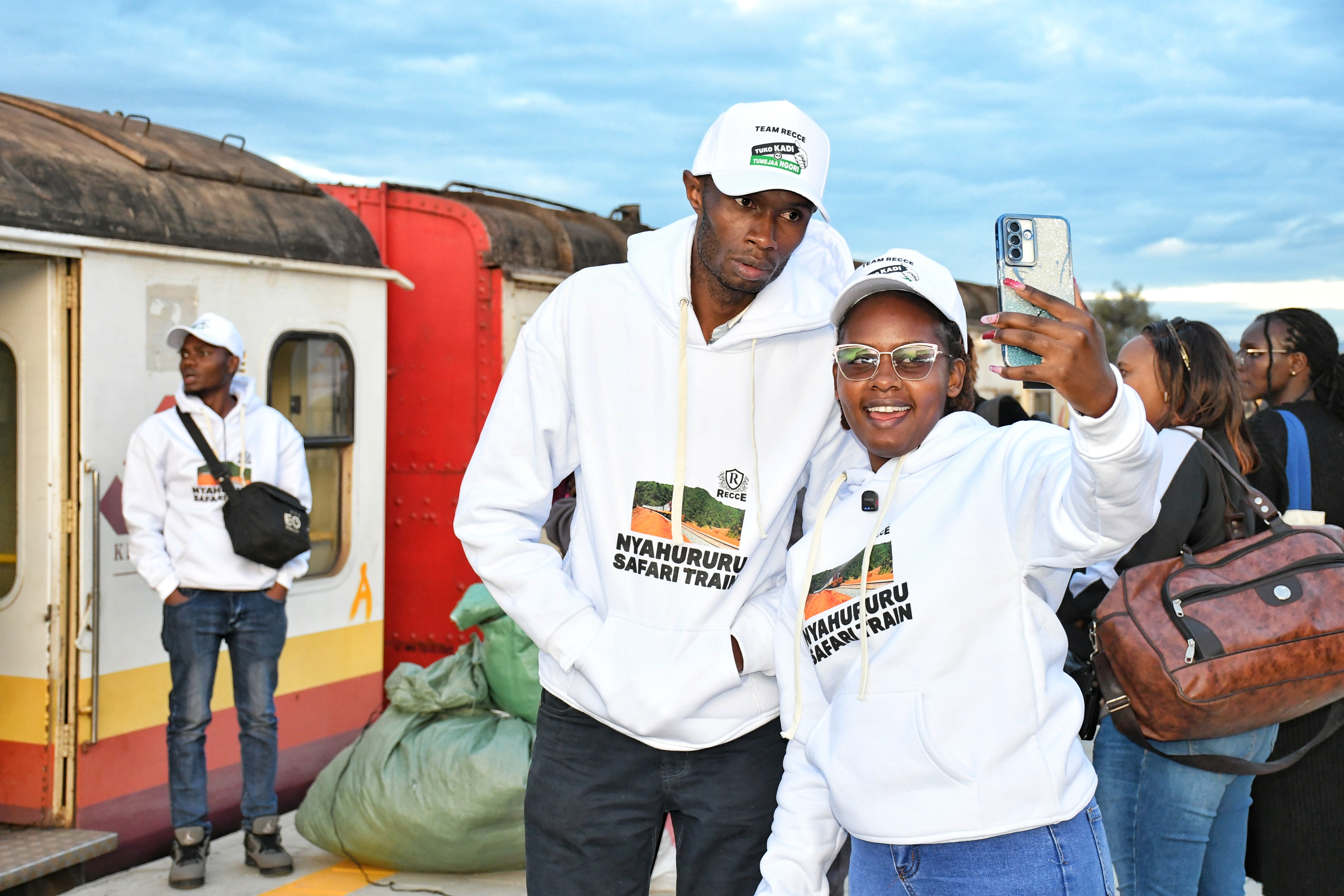 Customers enjoy a selfie after alighting a train at the newly refurbished Gilgil Railway Station en-route to Nyahururu, after the Kenya Railway Corporation revived and started operations of the Gilgil-Ol Kalou- Nyahururu town route, which has been dormant for the last 46 years.