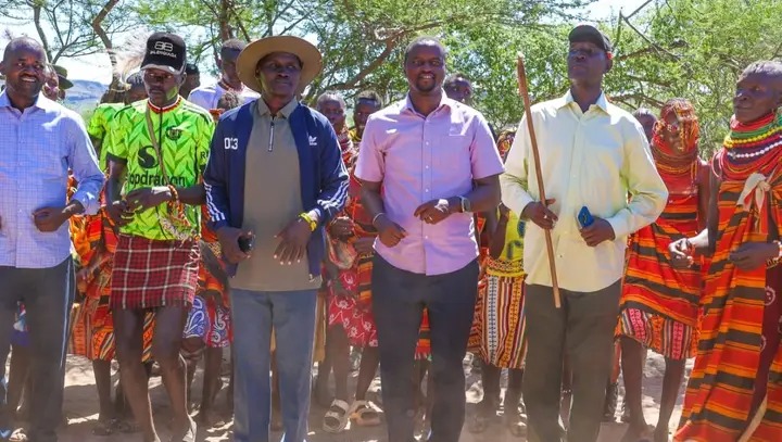 Health County Executive Committee Member Dr Joseph Epem in purple shirt doing a jig at Suguta during the launch of a new hospital. 