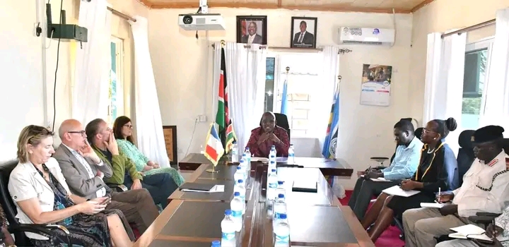 . Turkana County Governor Jeremiah Lomorukai chairs a meeting attended by the EU ambassador to Kenya Henriette Geiger and the French Ambassador Arnaud Suquet before commissioning of the green mini grid project in Locheremoit, Turkana 