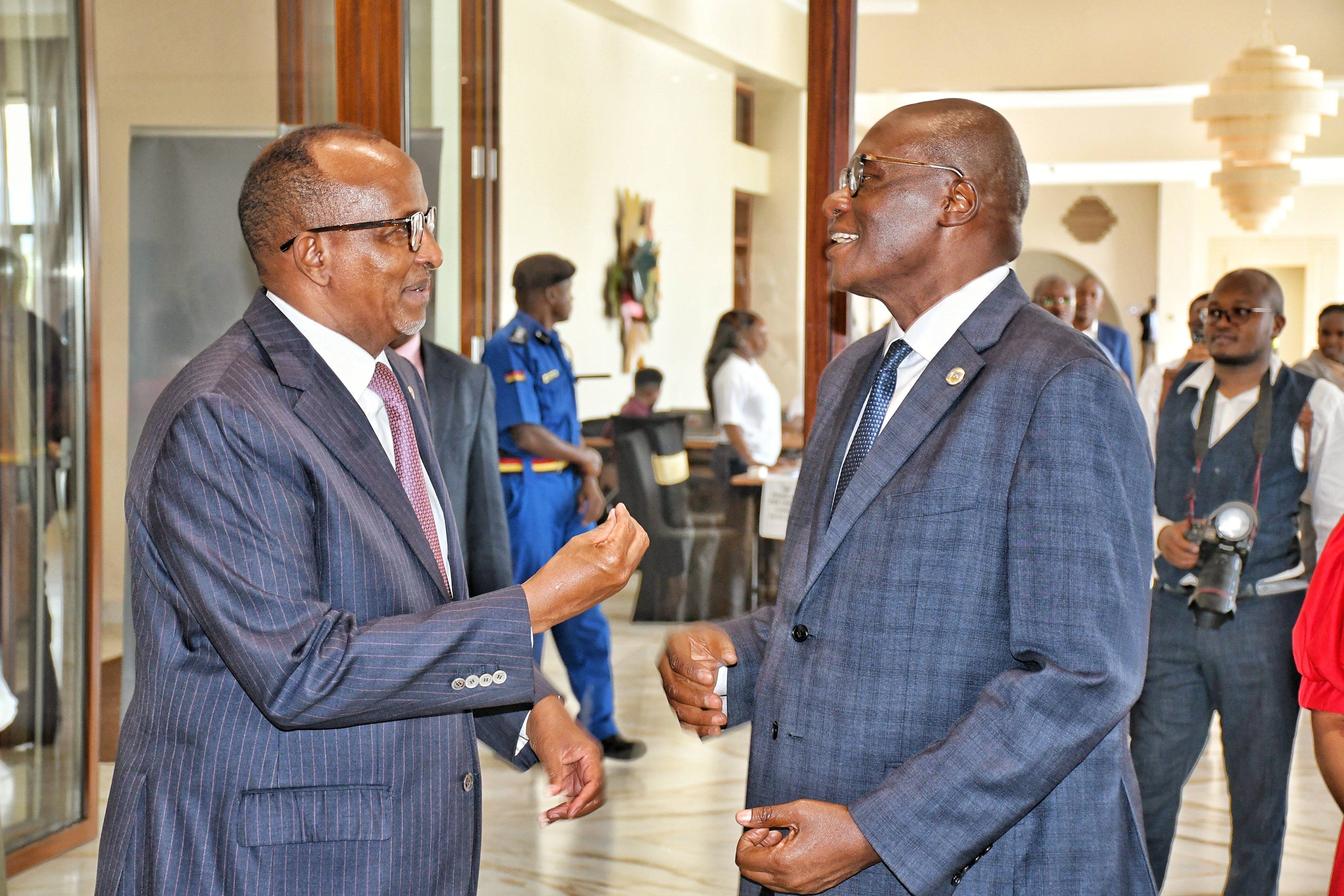Health Cabinet Secretary Aden Duale (left) engages Director General for Health Dr. Patrick Amoth on the sidelines of the 53rd Kenya Medical Association Scientific Conference, held in Naivasha
