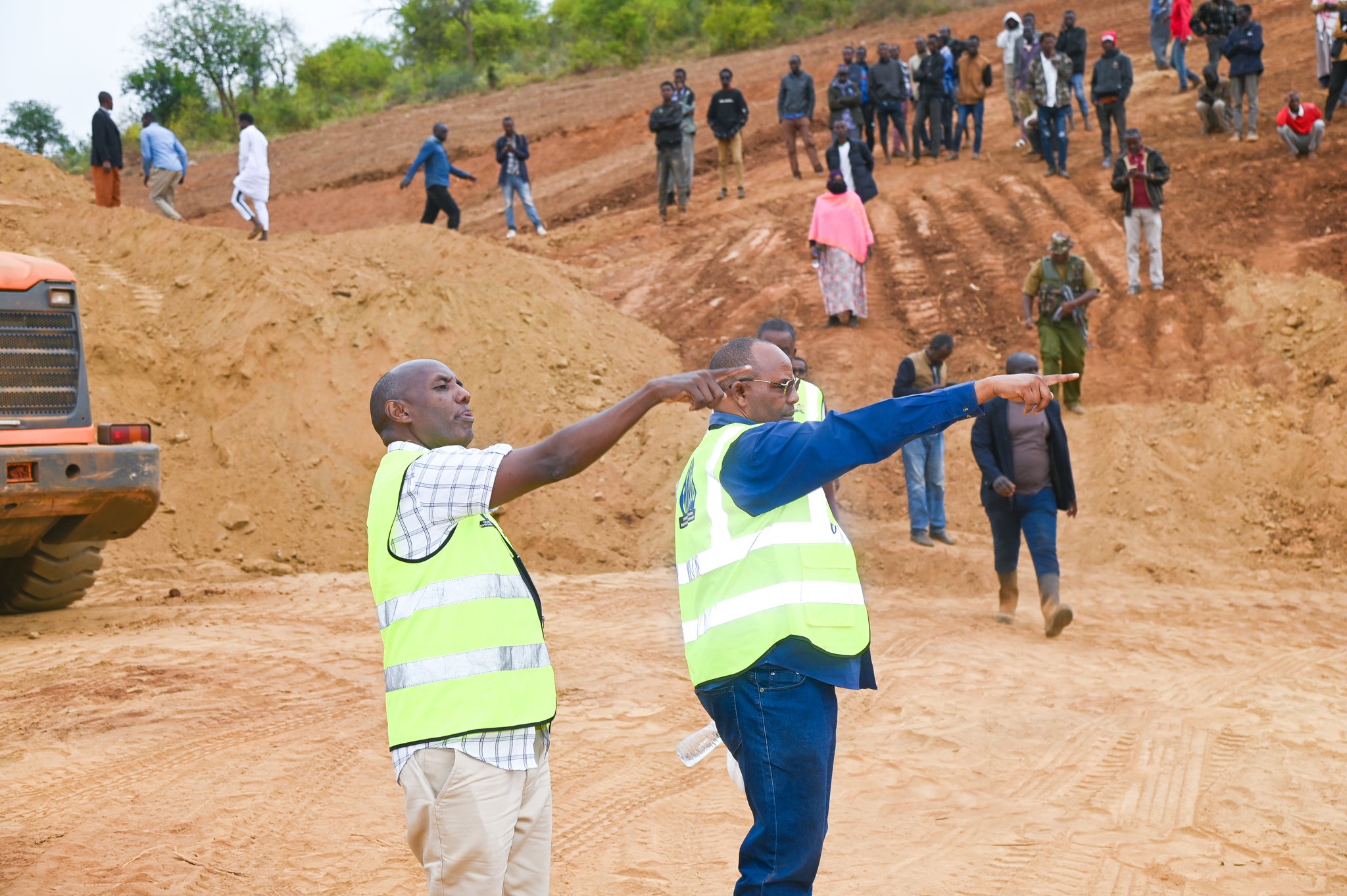 State Department for ASALs and Regional Development Kello Harsama (centre) inspects the ongoing construction of Somare Dam in Moyale, Marsabit County.