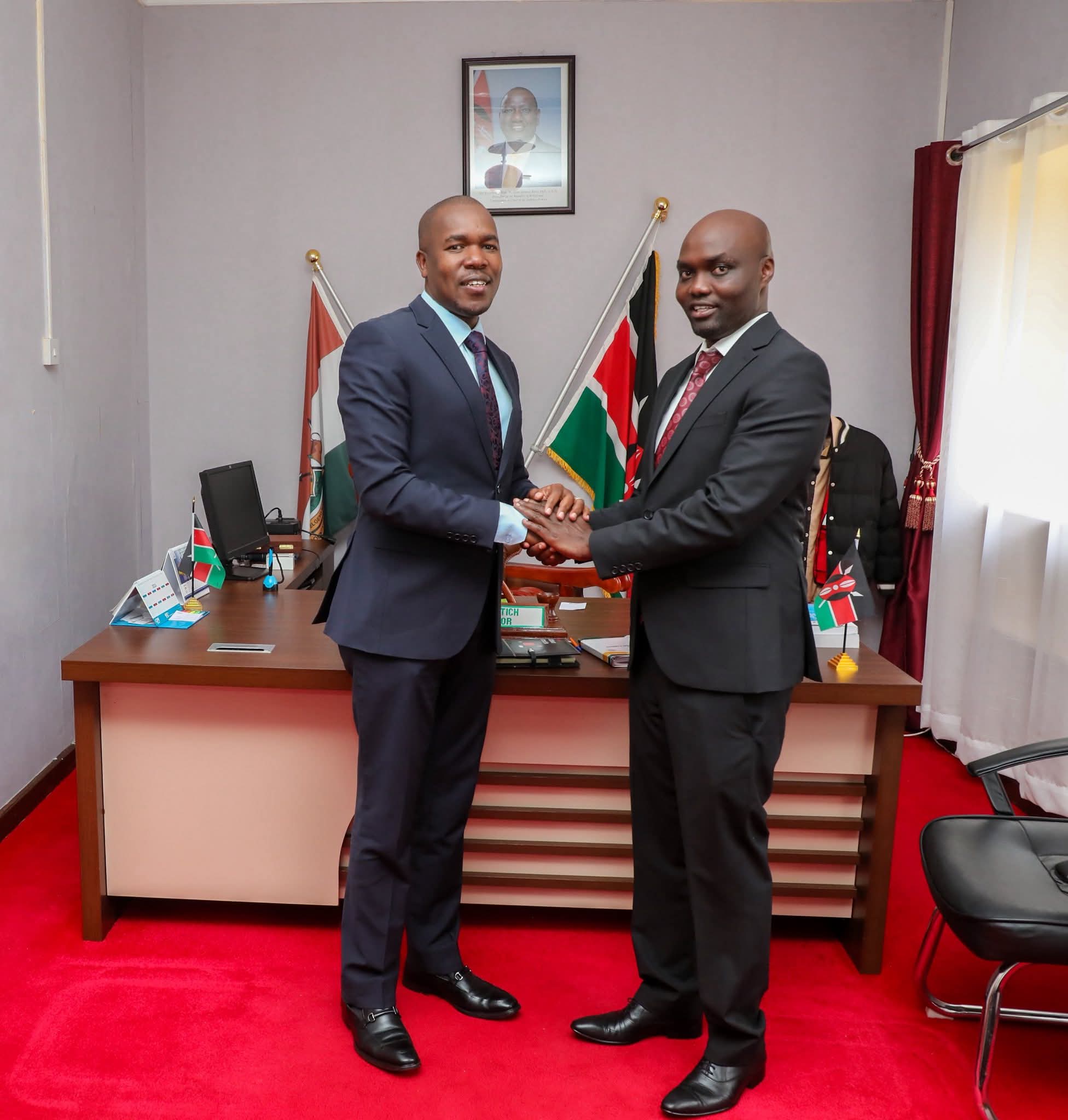 New KCC Managing Director Joseph Choge ( left ) and Elgeyo Marakwet  governor Wisley Rotich during the director's visit to the county’s headquarters in Iten.