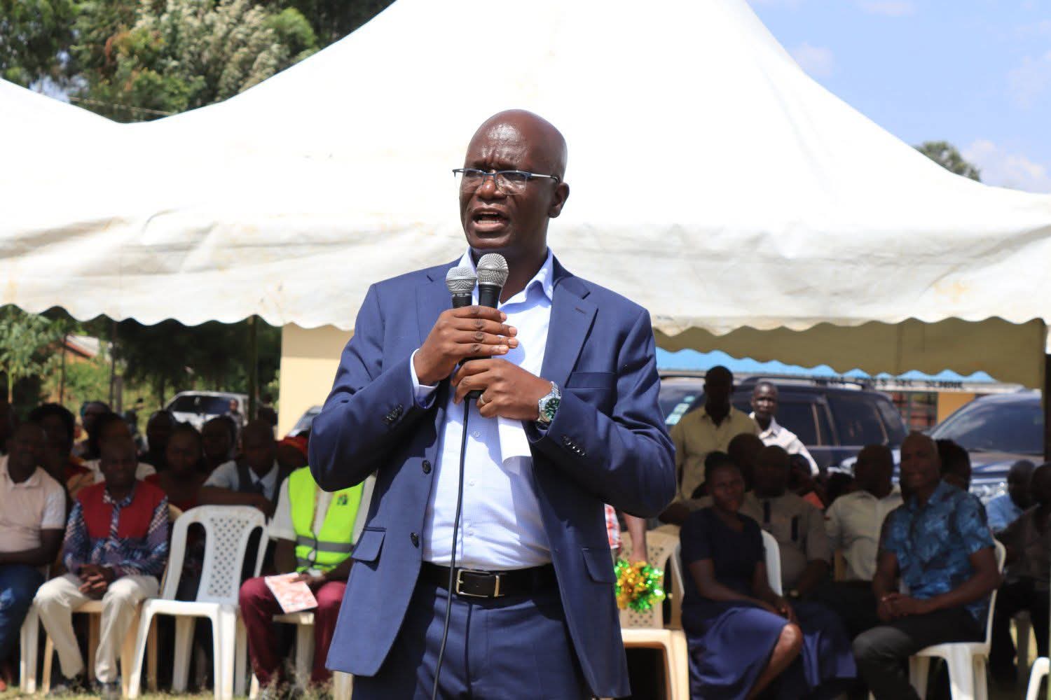 The Principal Secretary State Department for Economic Planning Boniface Makokha speaking at Sierra Girls Senior School in Nambale.