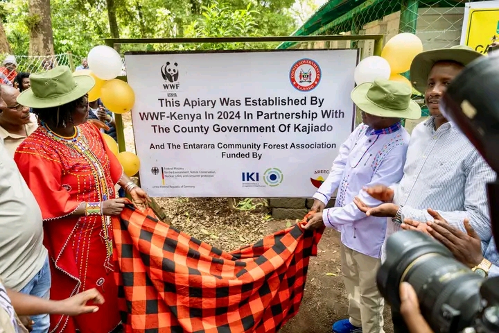 The Cabinet Secretary for East African Community, ASALs and Regional Development Beatrice Askul and the Principal Secretary for ASALs and Regional Development Harsama Kello commission an apiary during the inauguration of the Oloitoktok Integrated Conservation and livelihood program