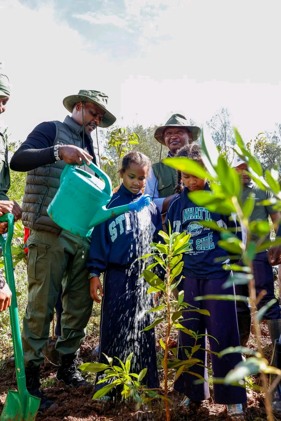 State Department for Environment and Climate Change Principal Secretary, Eng. Festus Ng’eno and State Department for Irrigation Principal Secretary, Ephantus Kimotho planting a tree in Oloolua forest, Kajiado county.