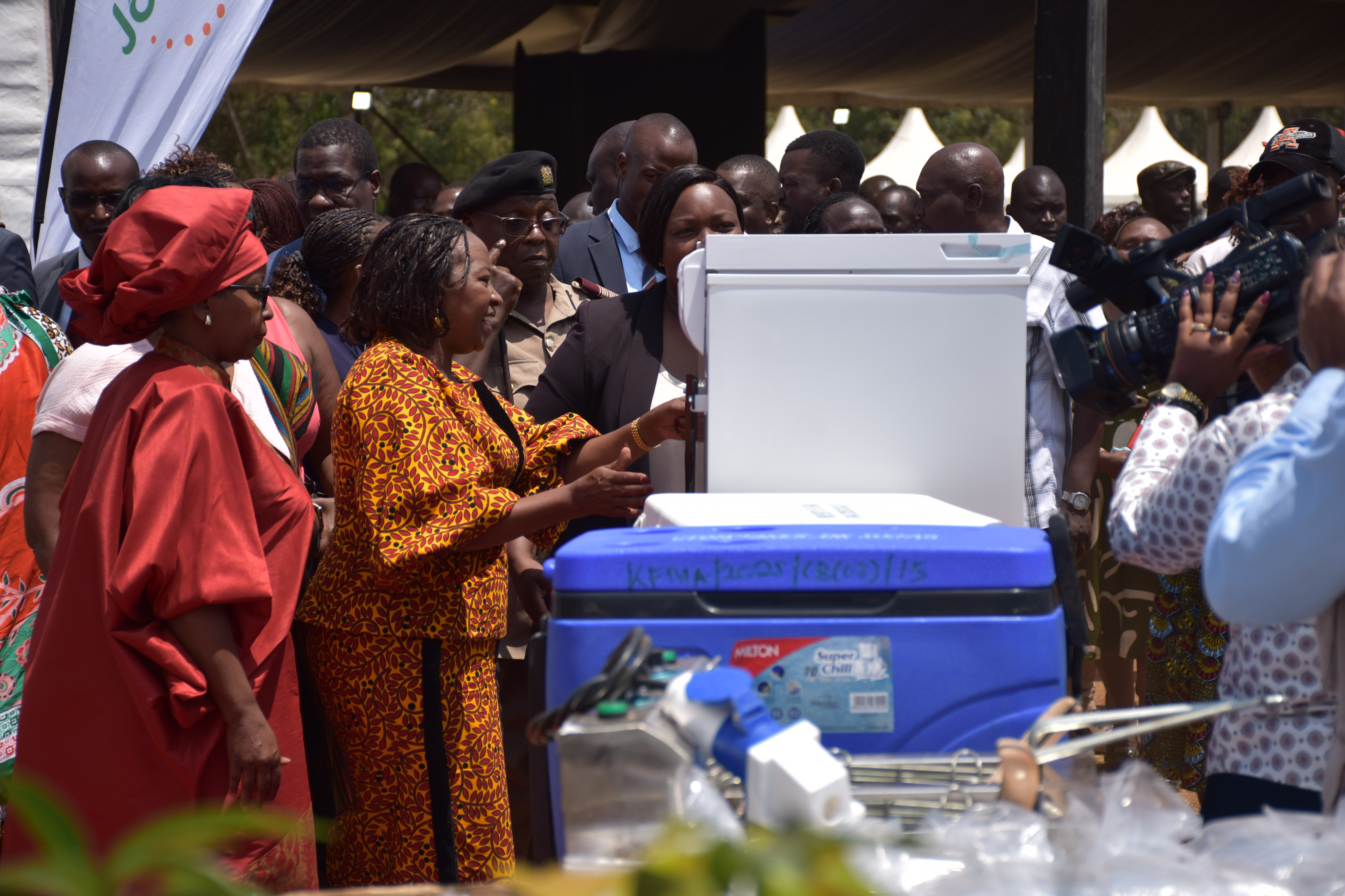 First lady Rachel Ruto flanked by Siaya governor’s spouse Betty Orengo (in red) inspecting a freezer to be issued to women