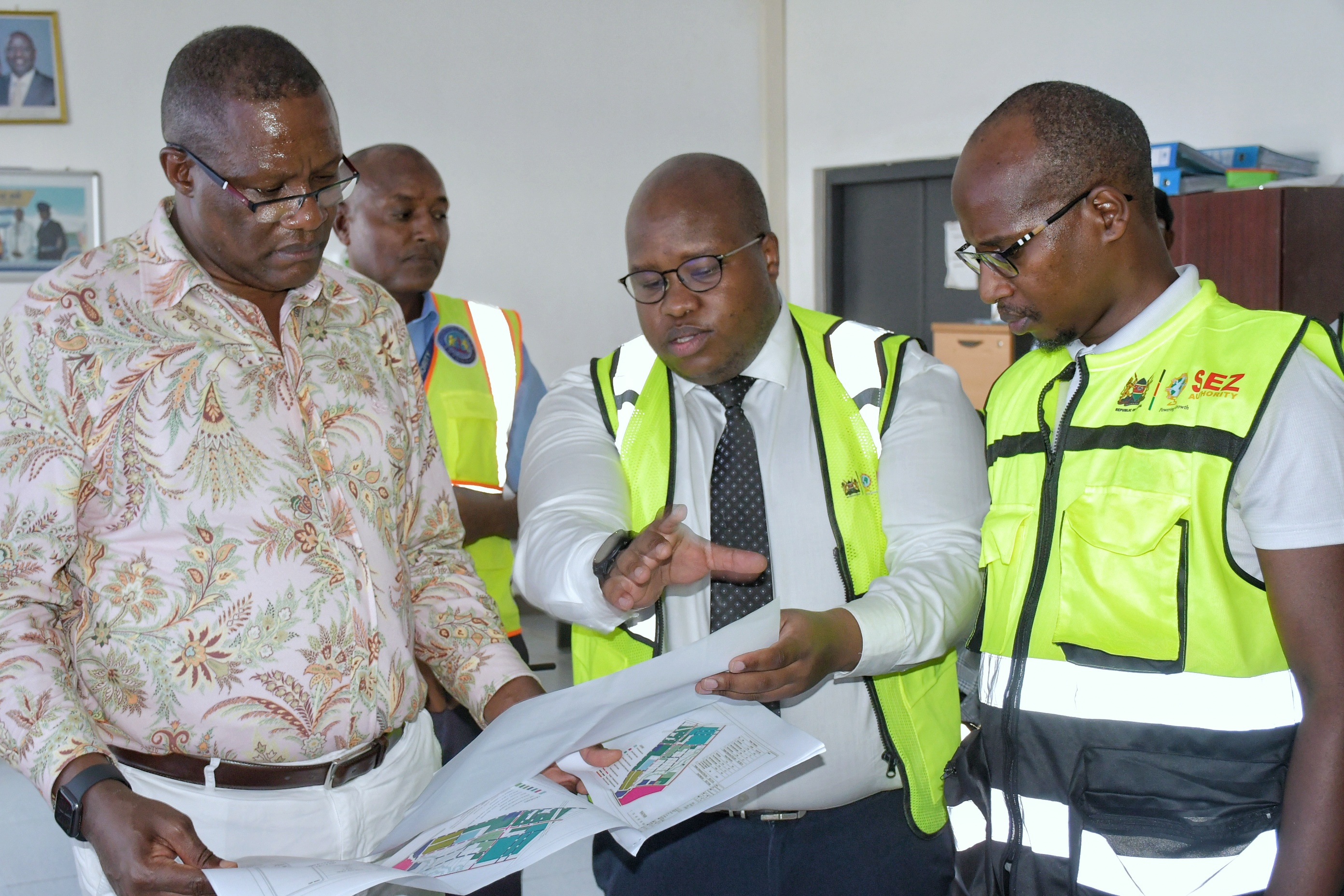 Deputy Chief of Staff in charge of Performance and Delivery Management at the Executive Office of the President, Mr. Eliud Owalo (left) engaging officers from the Special Economic Zone Authority on the Naivasha SEZ master plan