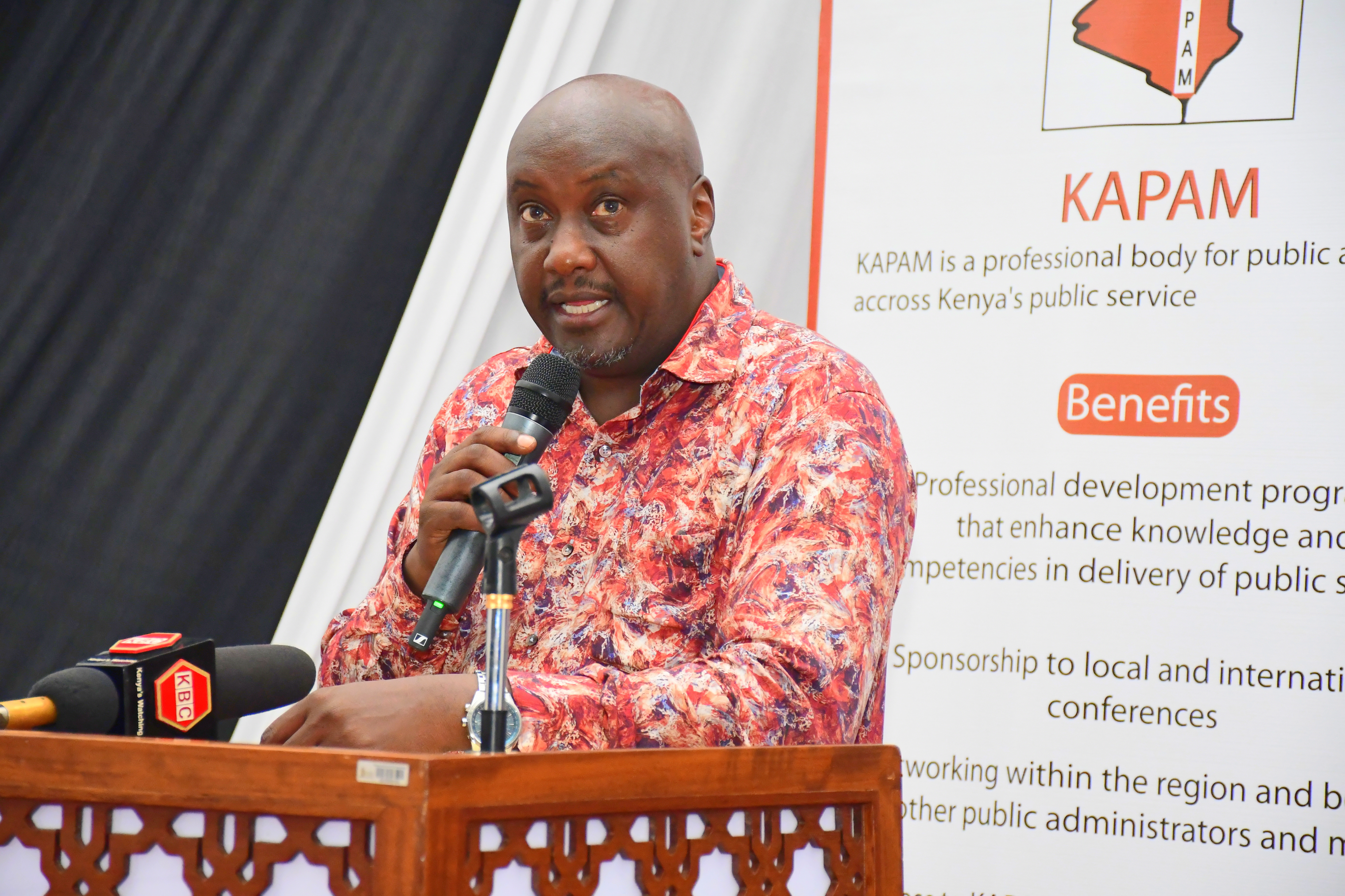 Deputy Head of Public Service Amos Gathecha gives the keynote address during the symposium on smart governance at the Kenya School of Government, Mombasa.