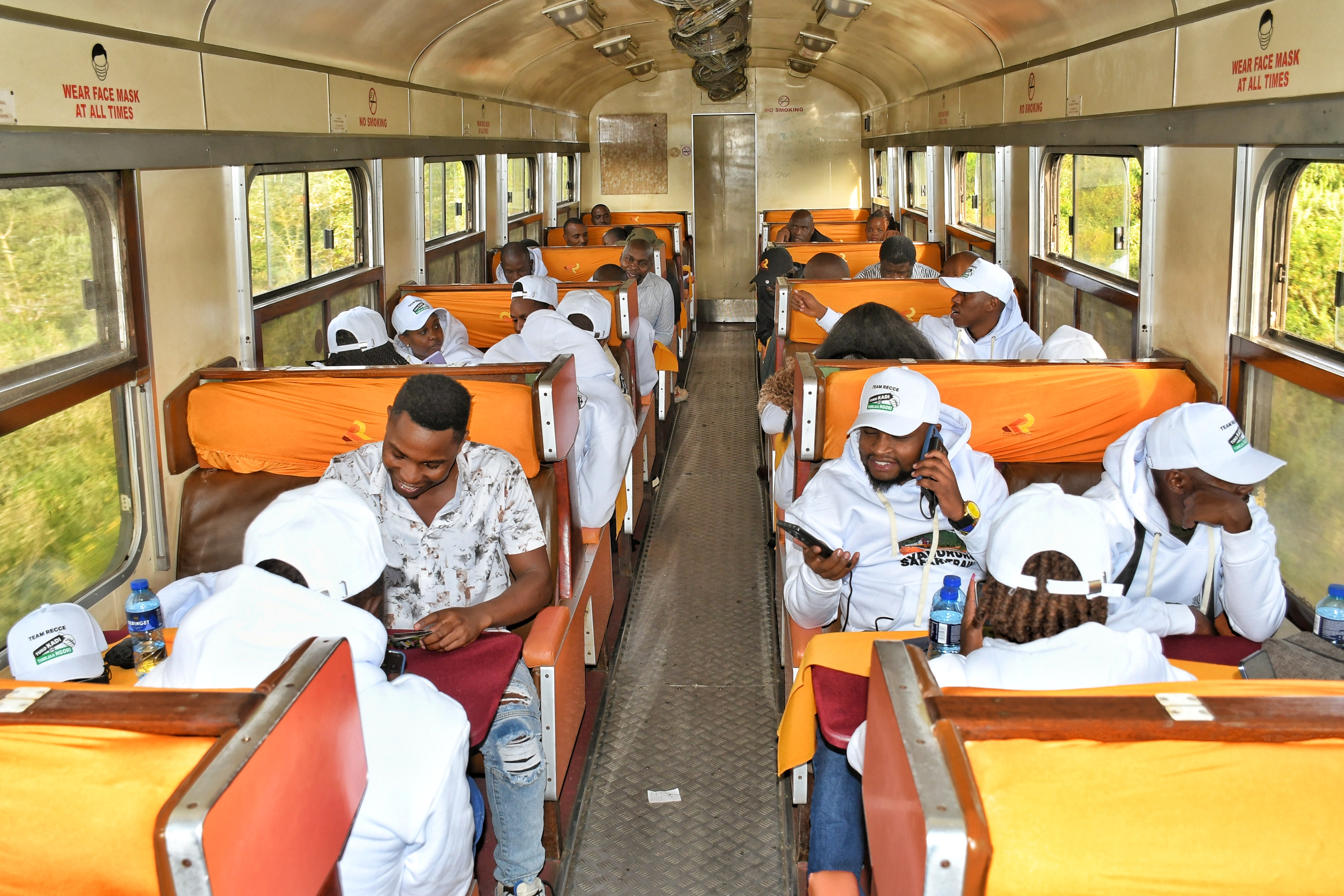 Passengers aboard a train from Nairobi through Naivasha -Gilgil -Ol Kalou- Nyahururu route, which has been operationalized to unlock economic potential of the Abardare region after the line operations were suspended 46 years ago. Photo by Erastus Gichohi. 