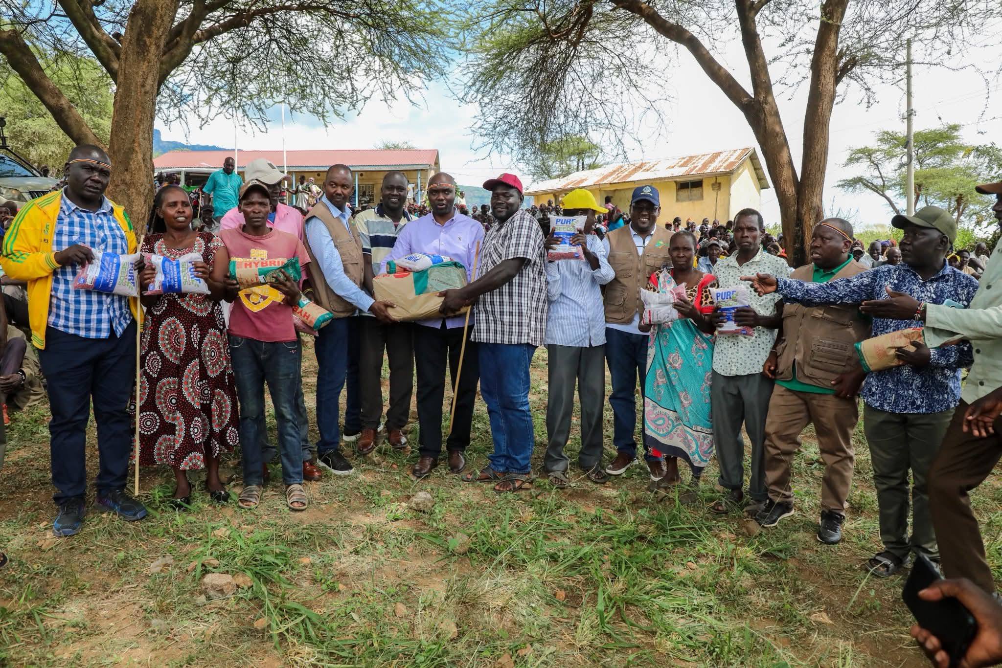 Residents of Endo ward, Kerio Valley Sub-County, who came to receive seeds being distributed by the county government.
