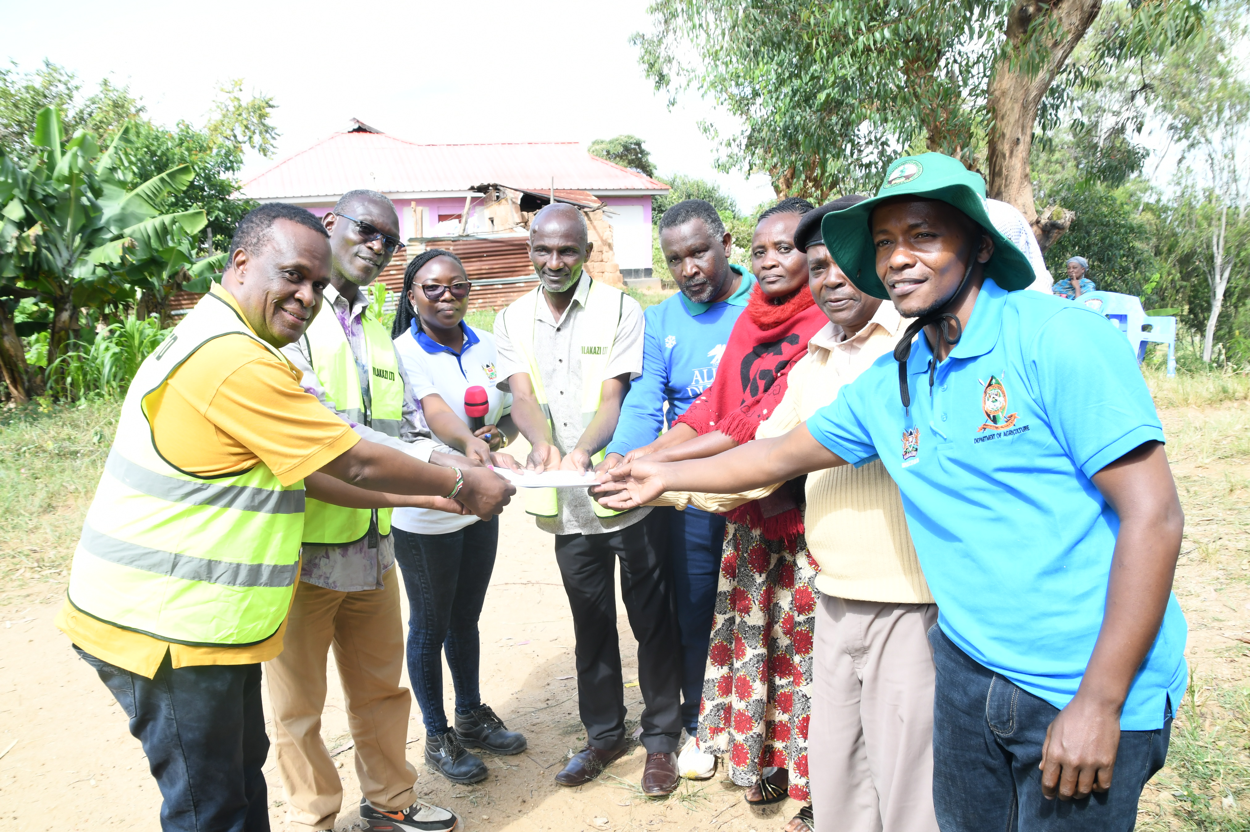 Chief Engineer/ Director Irrigation and Drainage, State Department for Irrigation, Eng. Bernard Onyango (5th  left) and his team inspect the water intake works at Laghale river in Wundanyi Sub-county, Taita-Taveta County. Photos by Kibet Cheptumo.   
