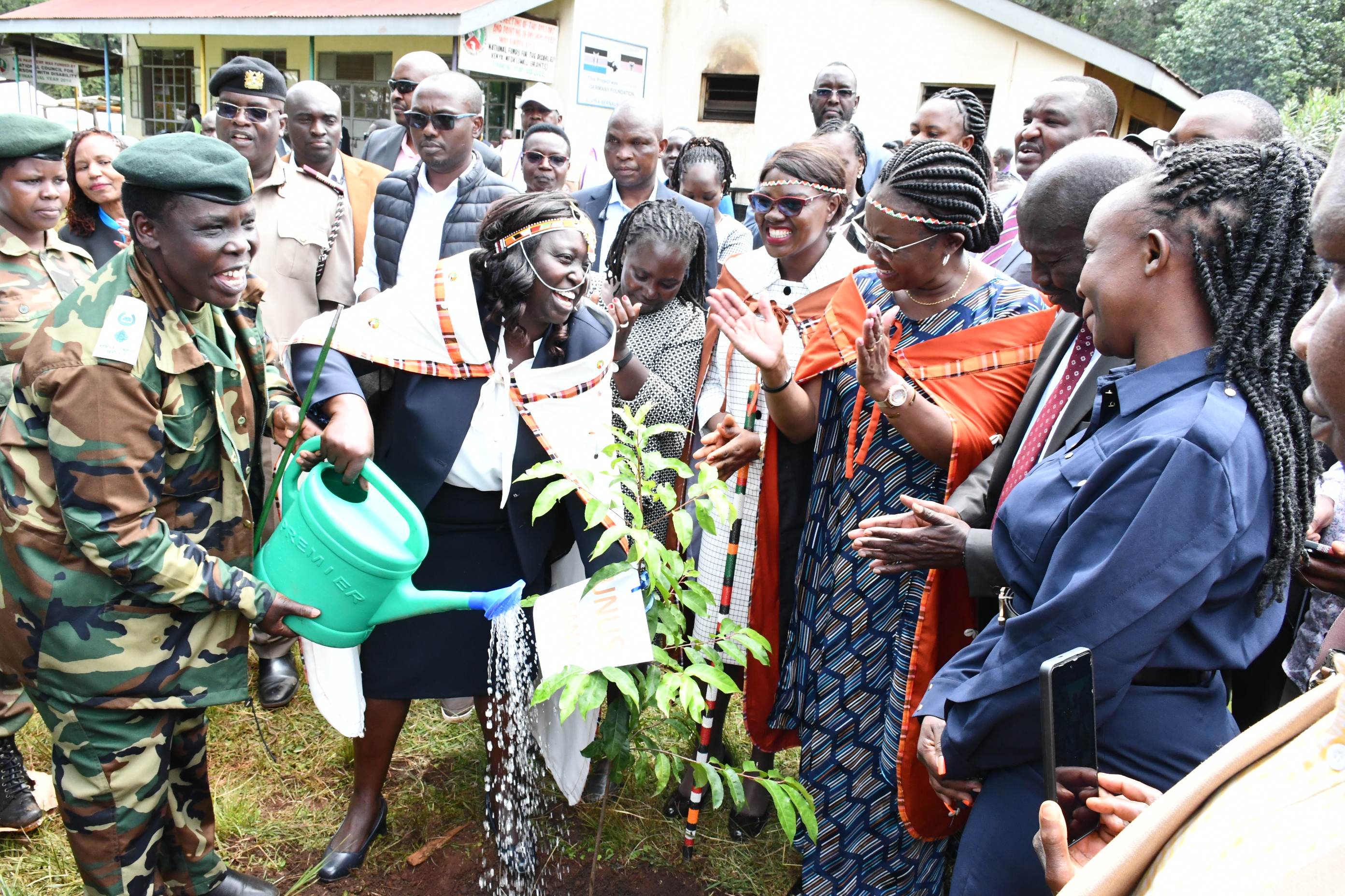 Cabinet Secretary (CS) for Gender, Culture and Children’s Services Hanna Cheptumo planting a tree at Kabarnet School for deafblind during the handing over of material and equipment in support to over 30 Baringo institutions with special needs children.