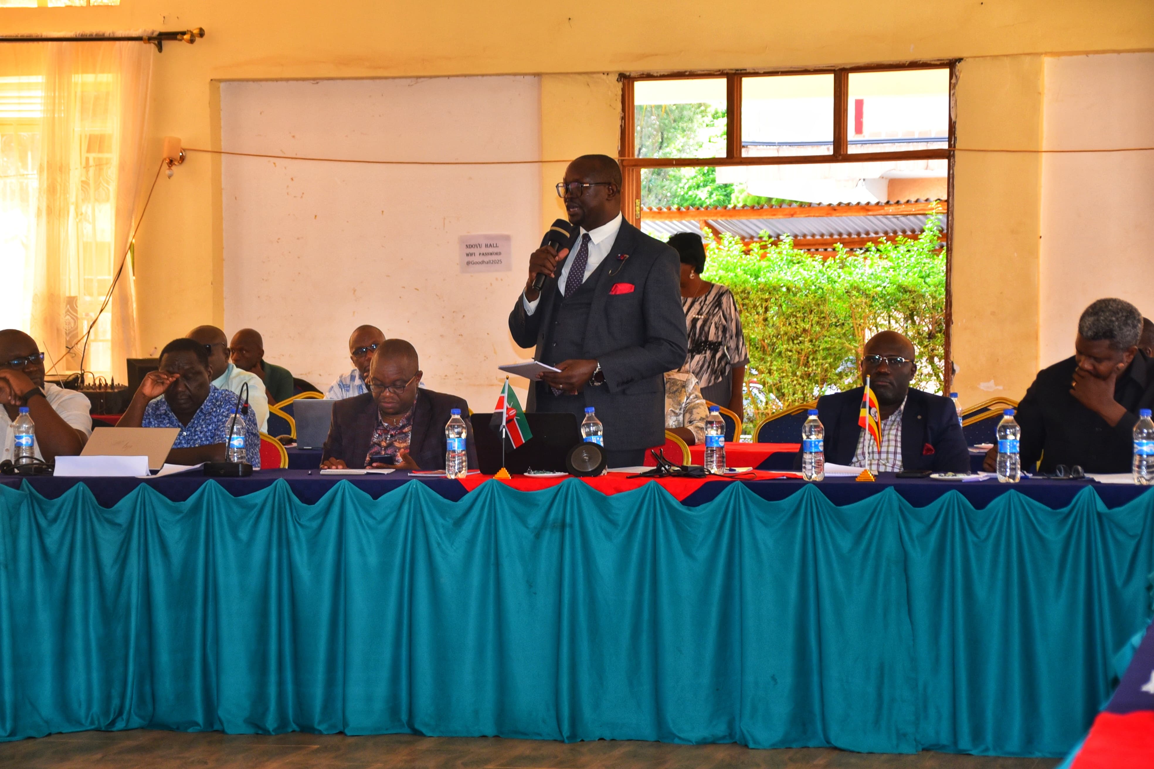 Dr. Joseph Lenai, Director for Primary Health Care at the Ministry of Health, Kenya, addressing delegates during the Joint Cross-Border Malaria Control Initiative Planning Meeting held at Farm View Hotel in Bu.