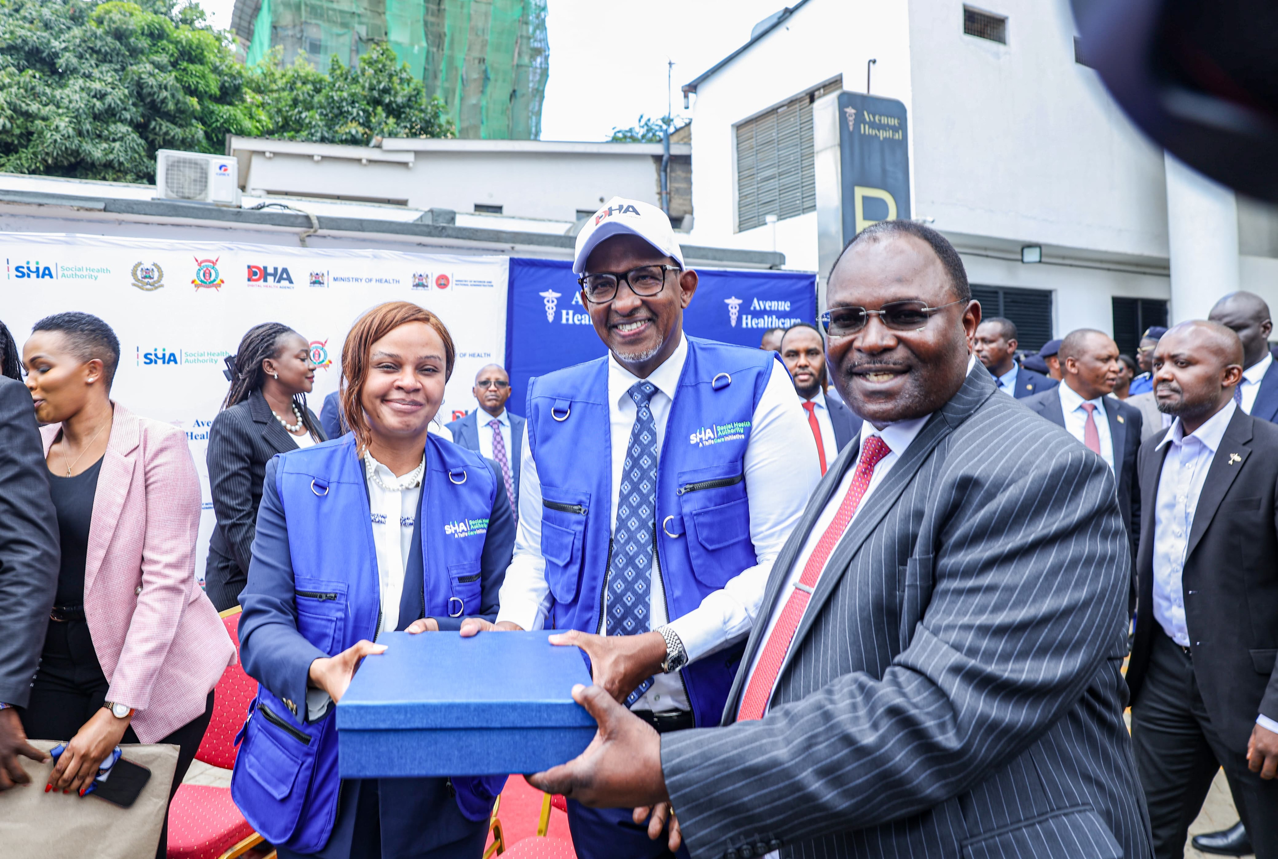 Officials during the rollout of Usalama Cover onboarding NPS and KPS officers to SHA.