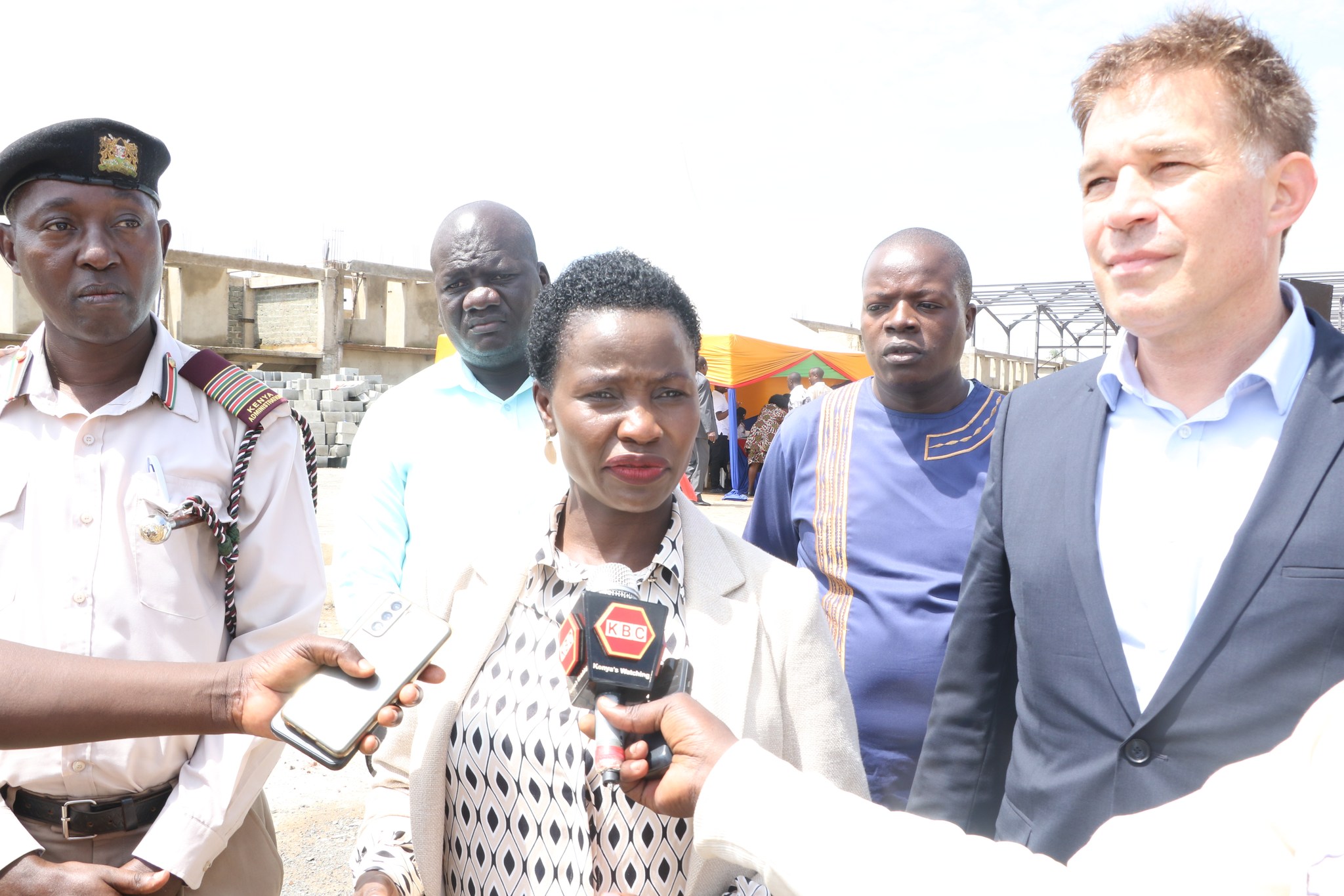 The Principal Secretary of Micro Small and Medium Enterprise (MSME’s) Susan Mang’eni (c) The country program director of GIZ Dr. Christoph Zipfel (r) and Busia County commissioner Chaunga Mwachaunga.